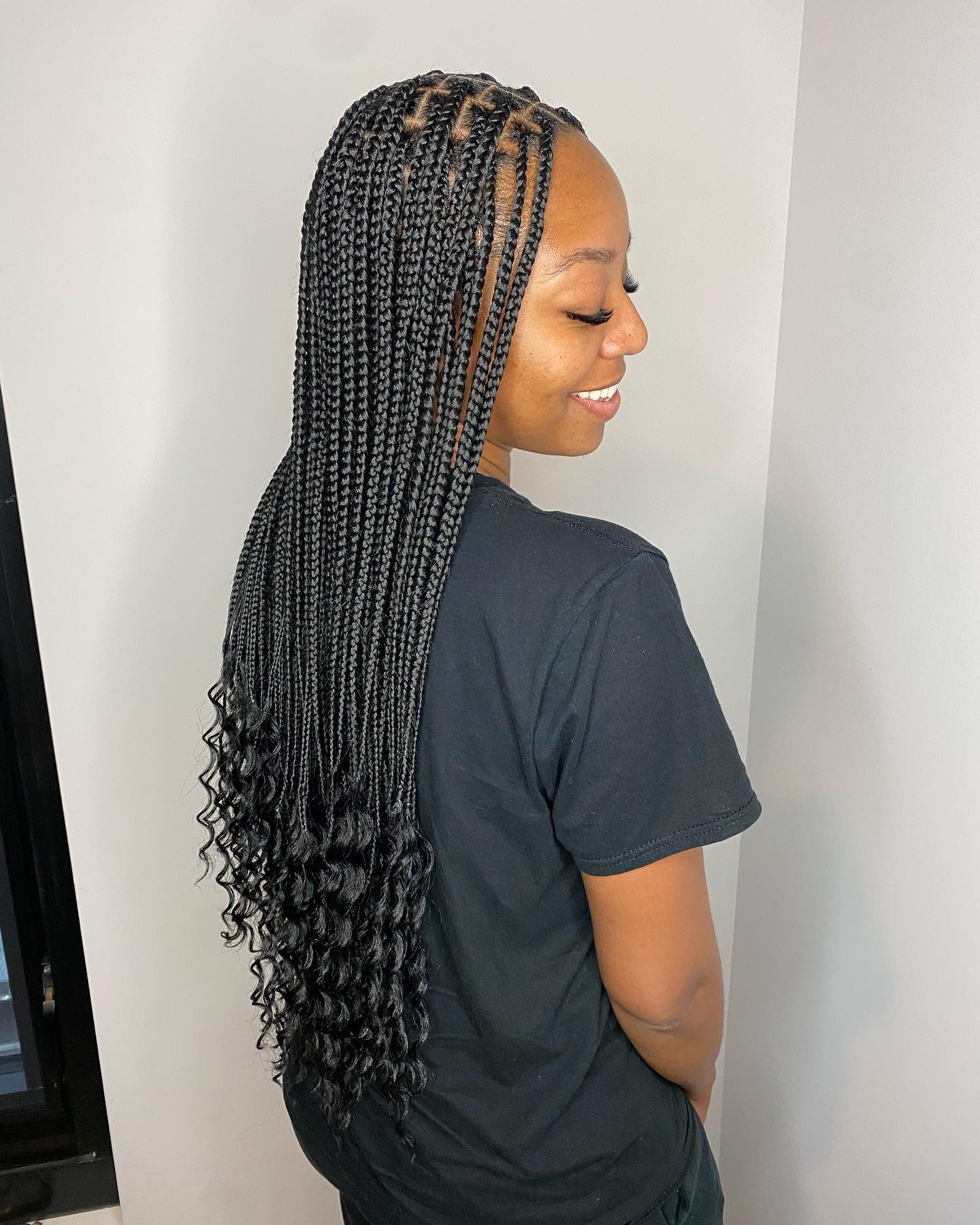 Long Box Braids With Loose Wavy Ends