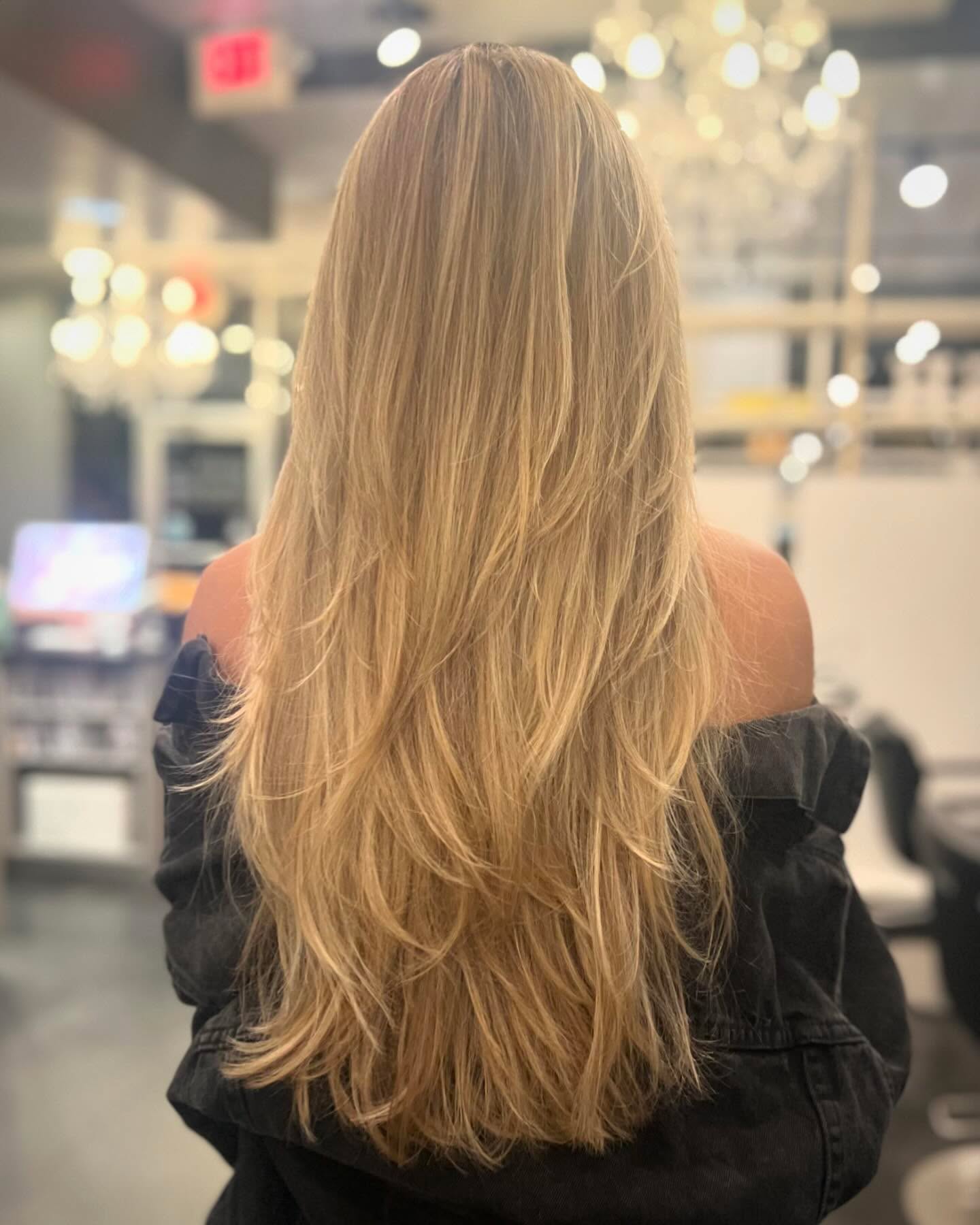 Long Layered Honey Blonde With Wispy Texture