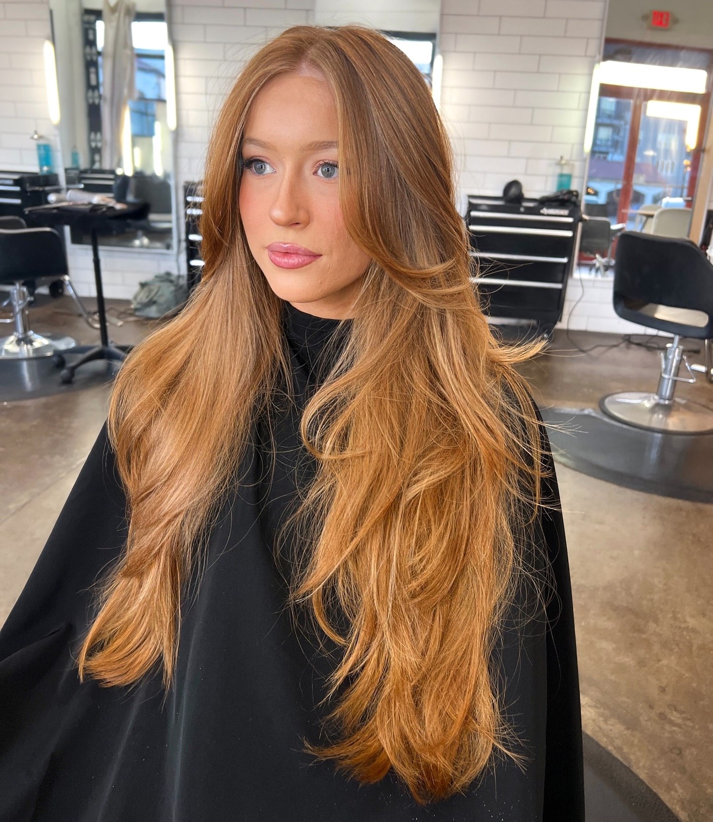 Long Layers With Sweeping Curtain Bangs