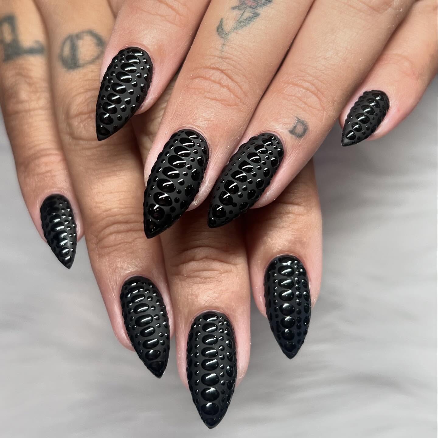 Matte Black Stiletto Nails with Glossy Bubble Design