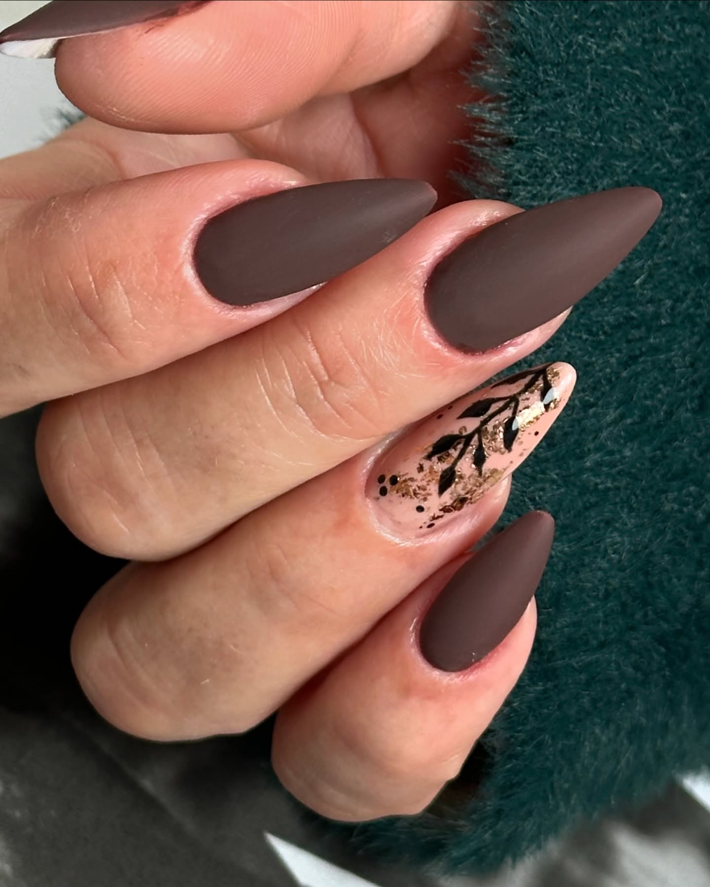 Matte Chocolate Almond Nails with Gold Leaf Accent