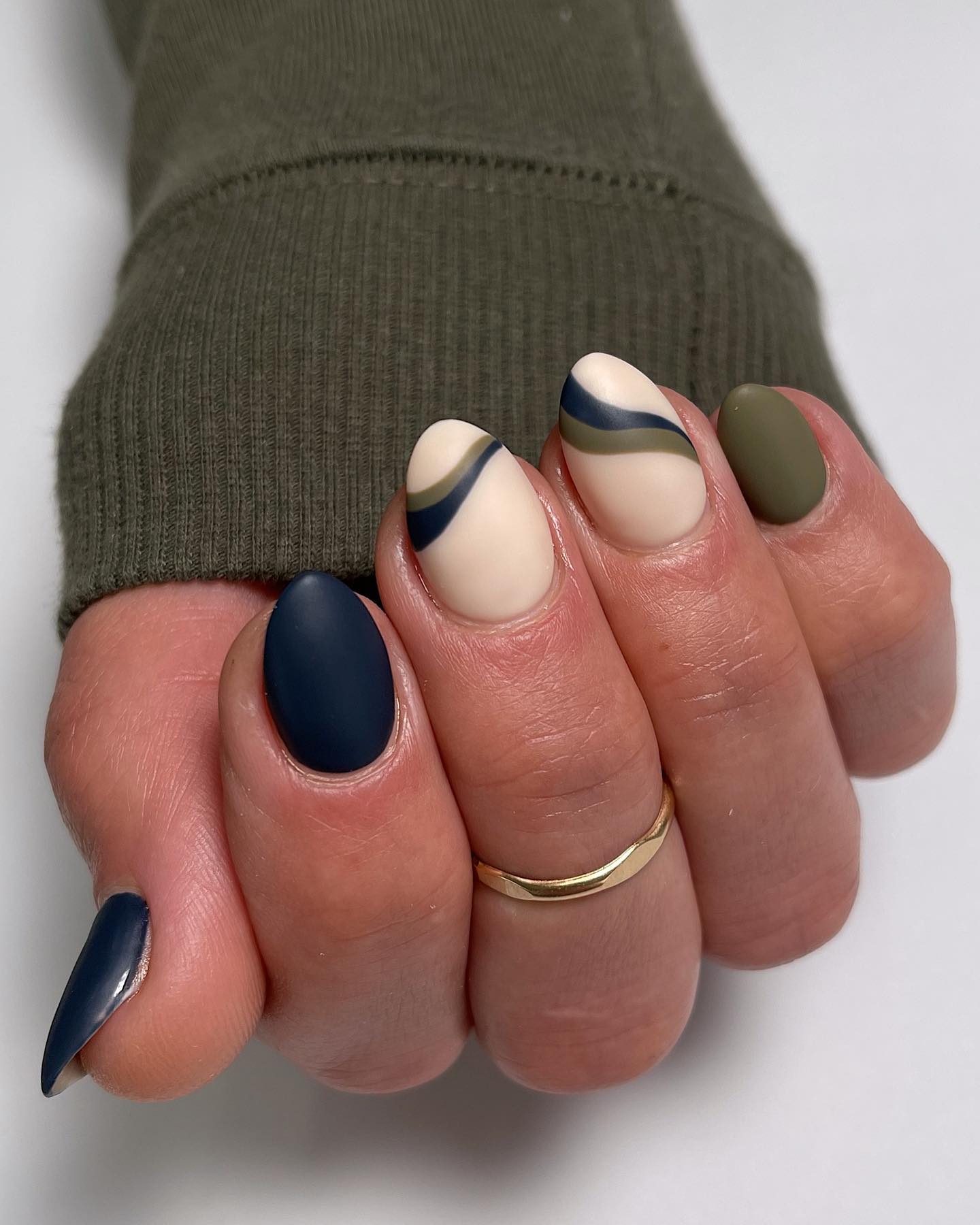 Matte Navy and Sage Swirl Almond Nails