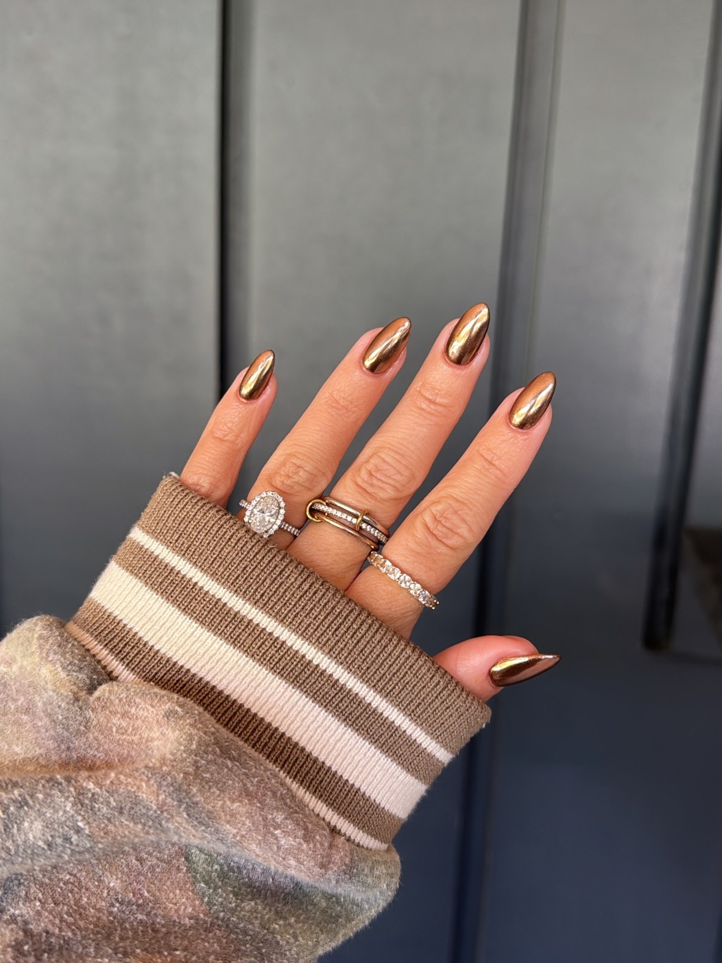 Molten Copper Chrome Almond Nails