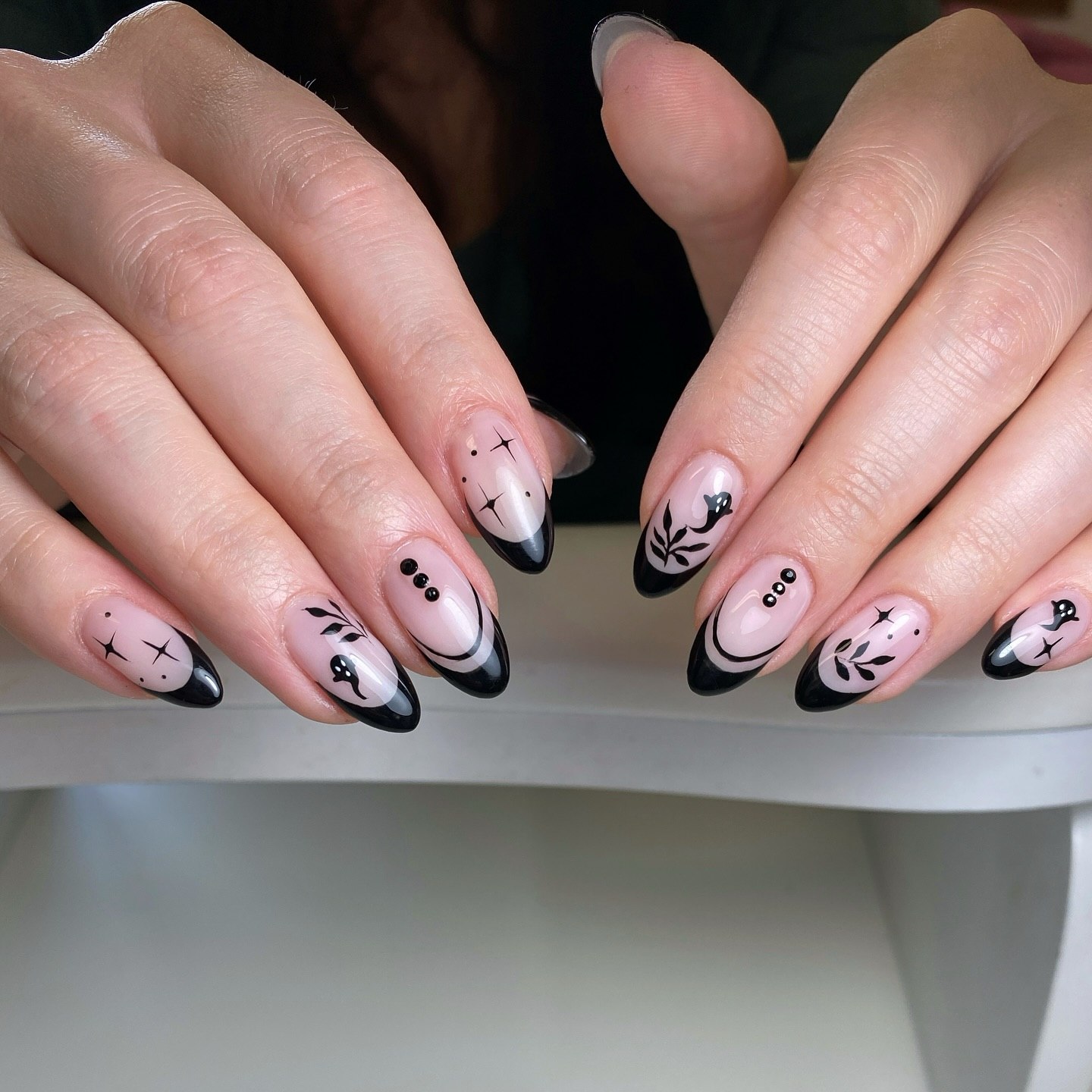 Mystic Black French Tip Almond Nails