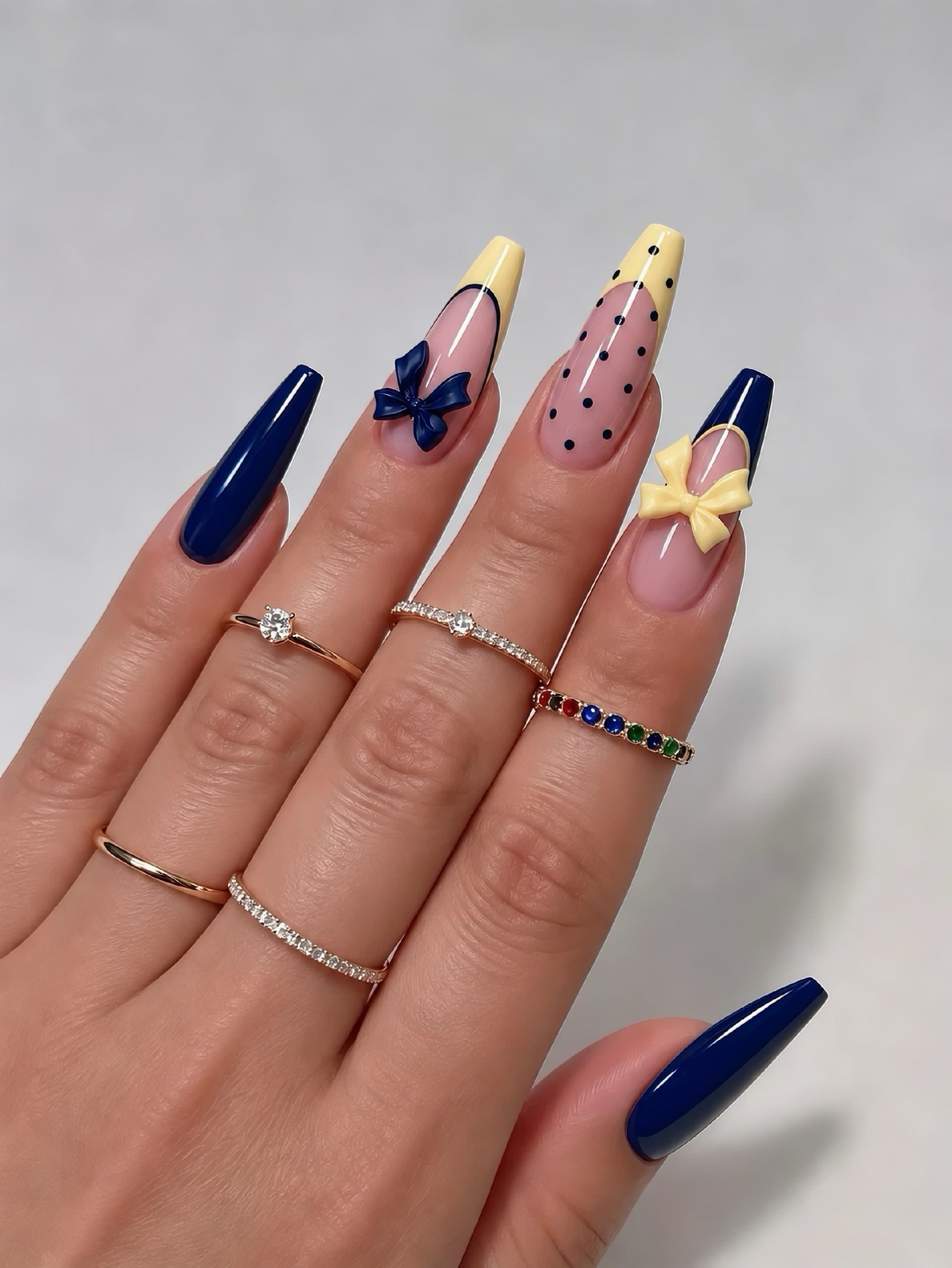 Navy Blue & Yellow French Tip Bow Nails