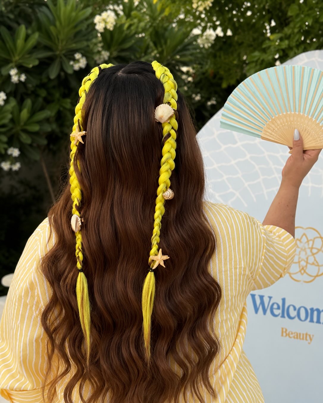 Neon Yellow Braided Accents On Long Brunette Waves