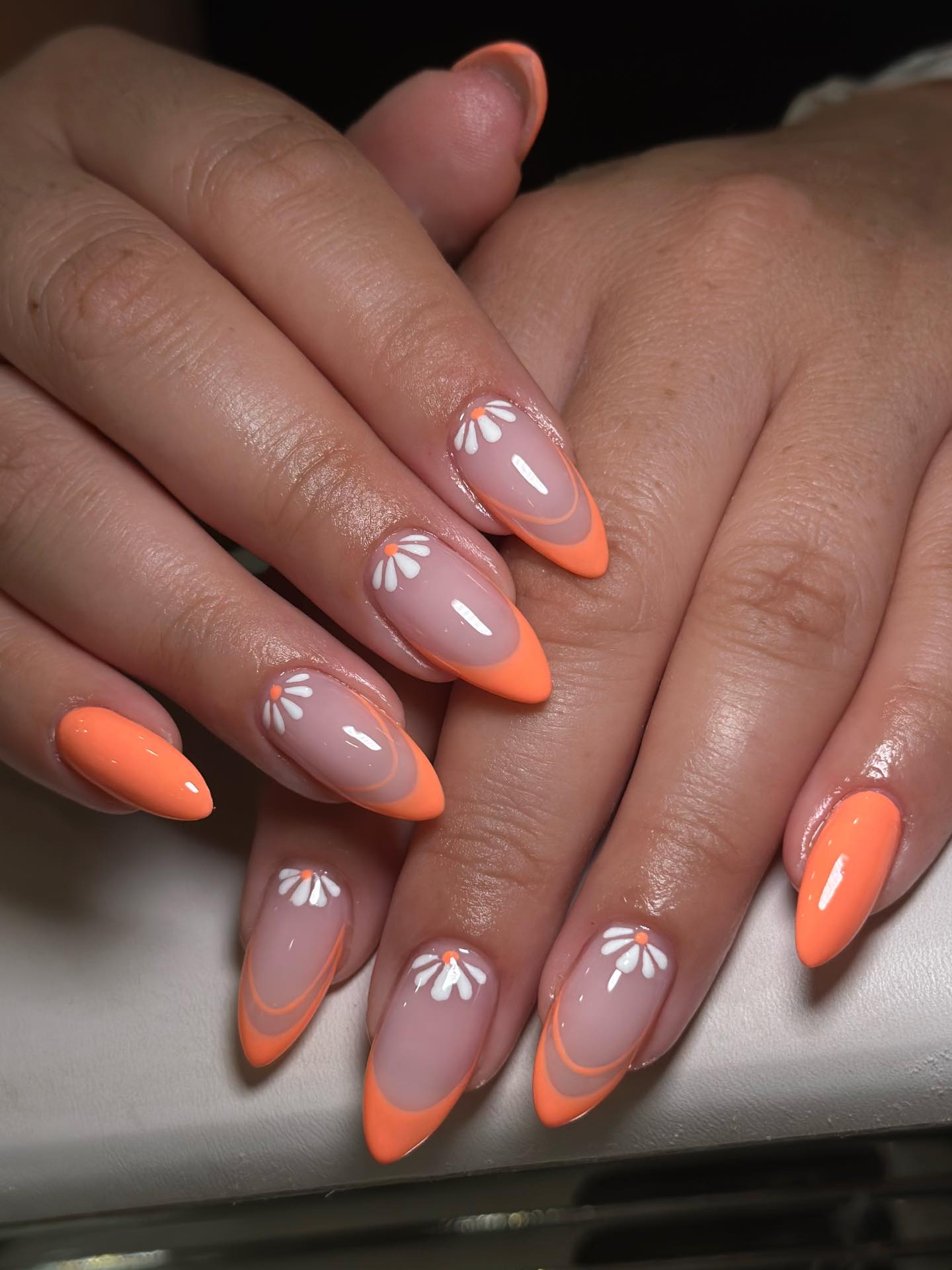 Orange French Tip Daisy Almond Nails
