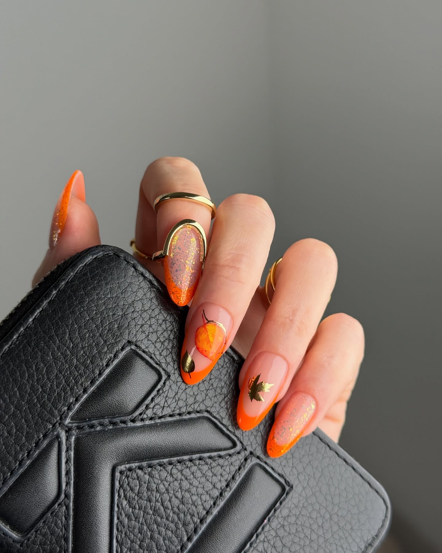 Orange Ombre French Tip Nails with Leaf Accents