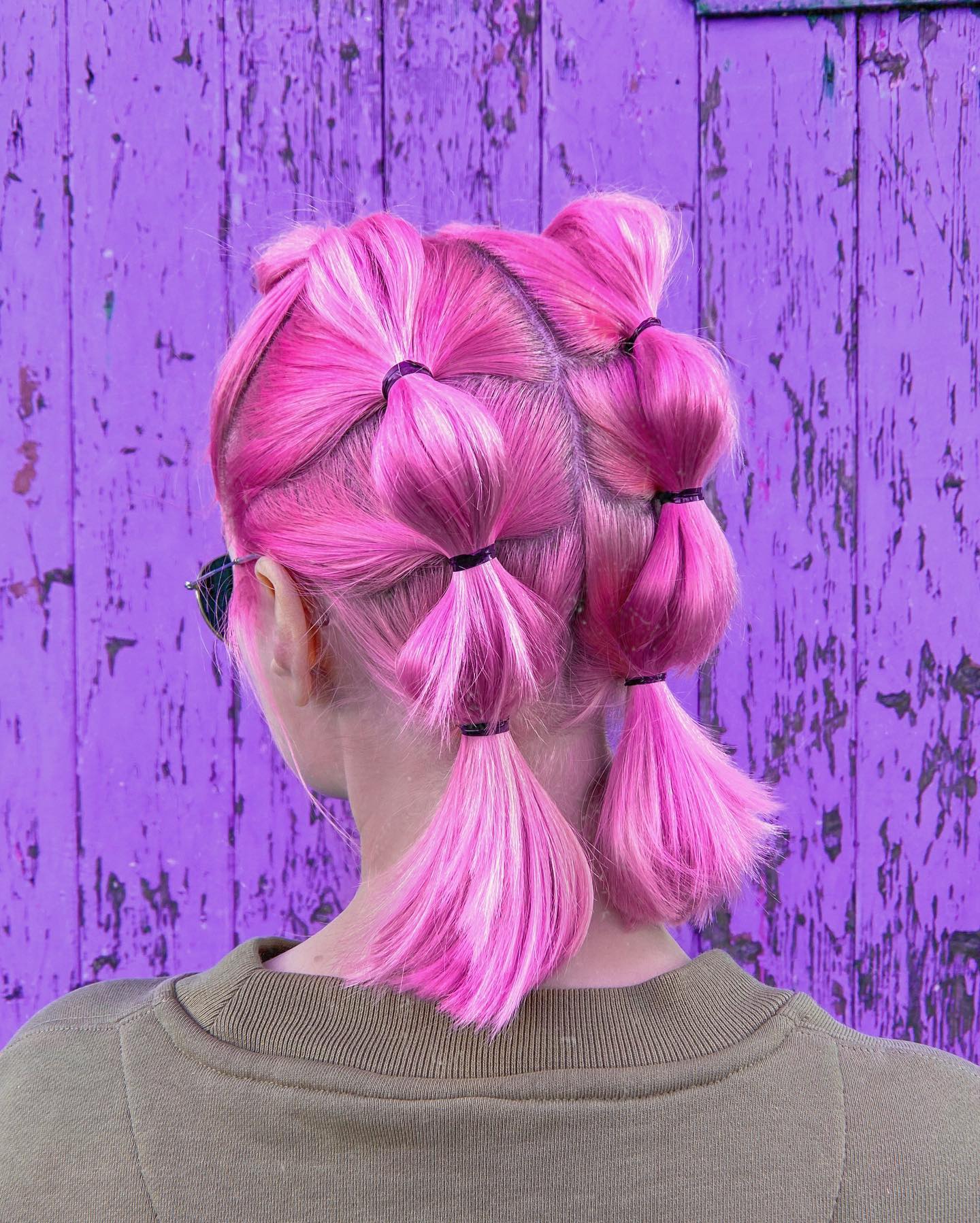 Playful Bubble Braids With Pink Hair