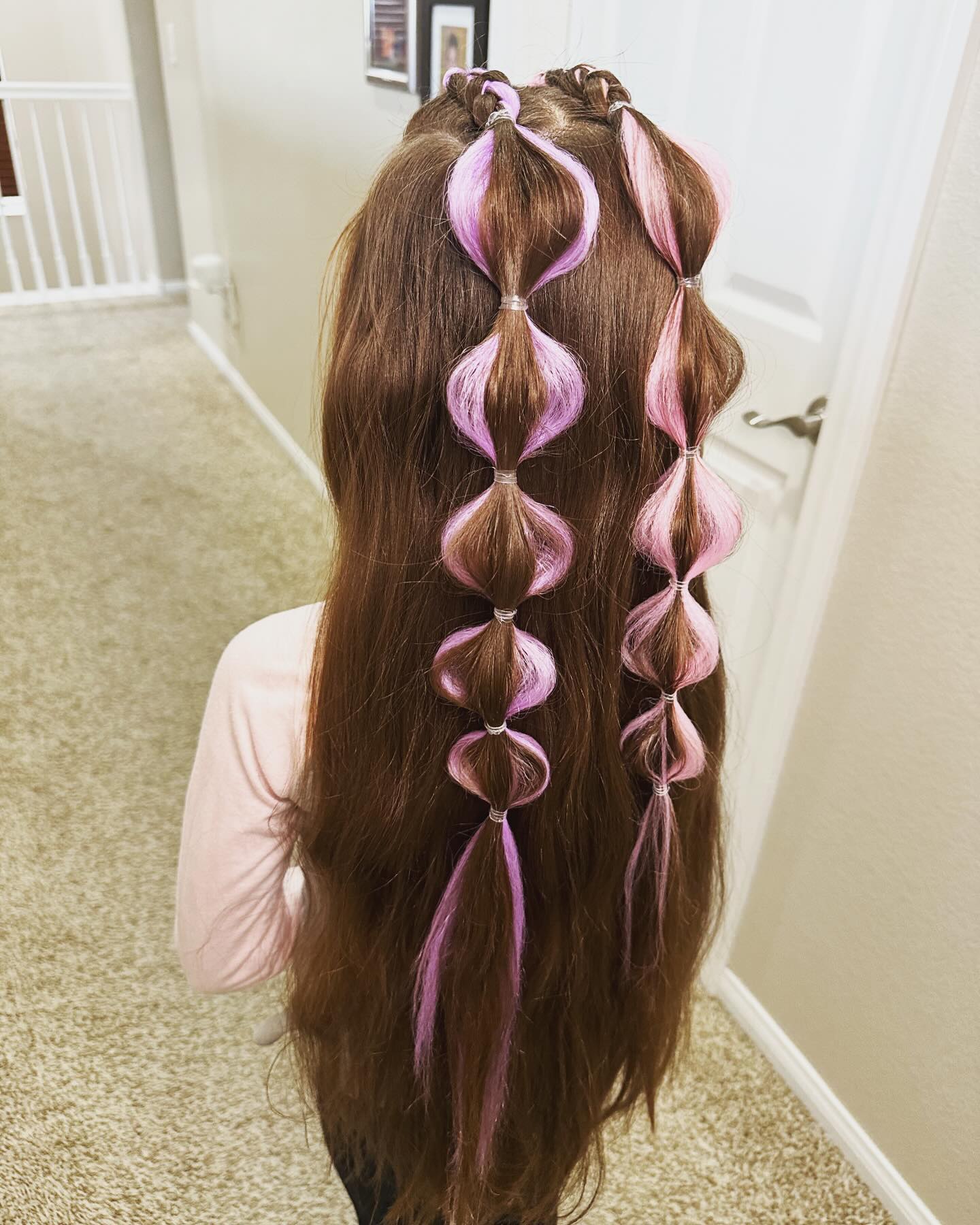 Playful Bubble Braids With Pink Streaks