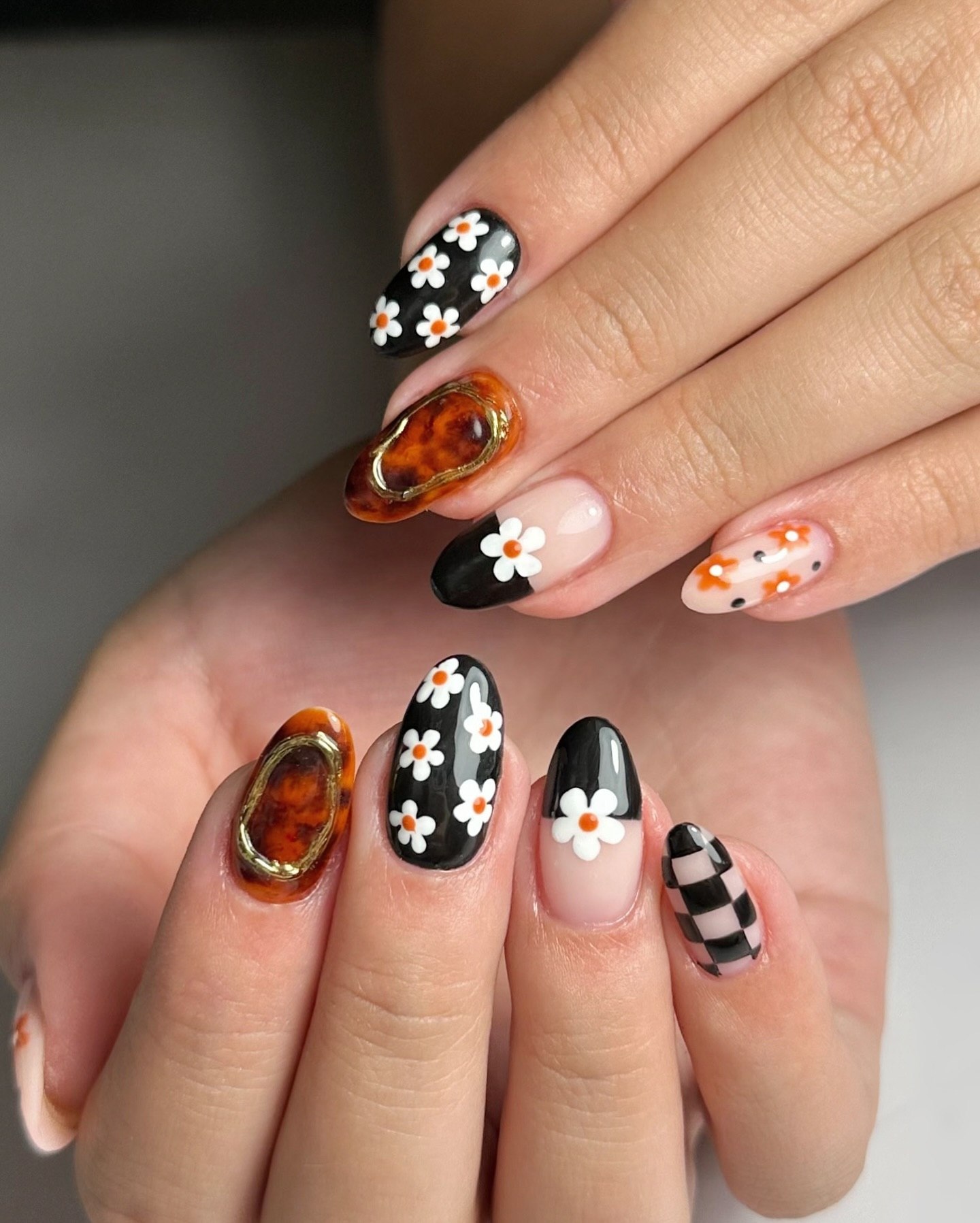 Retro Tortoiseshell Daisy and Checkerboard Almond Nails