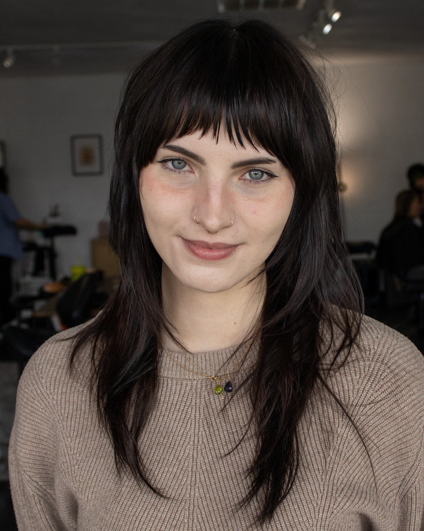 Shaggy Layers With Wispy Bangs On Dark Hair