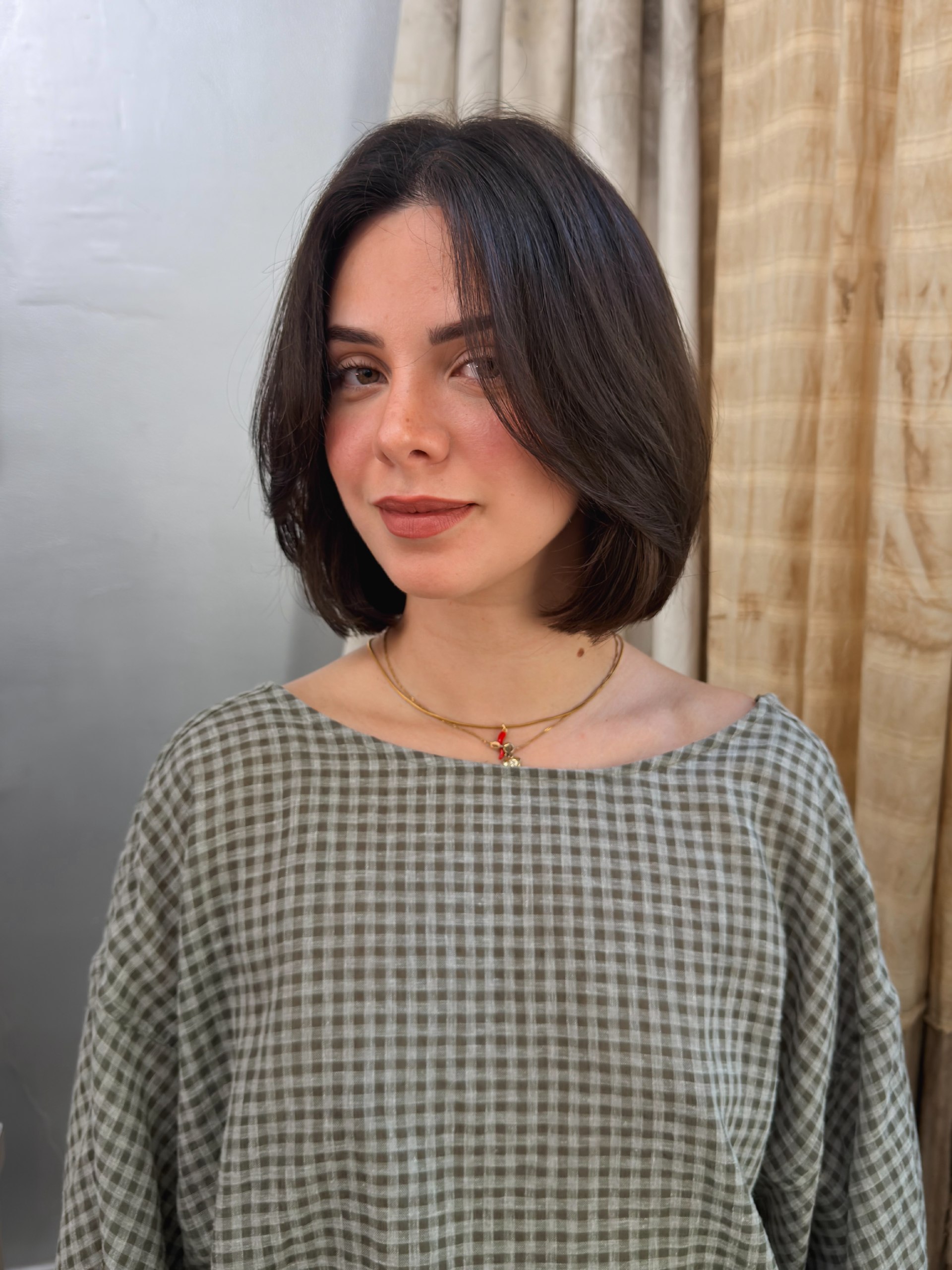Soft Layered Bob With Chin Length Curtain Bangs