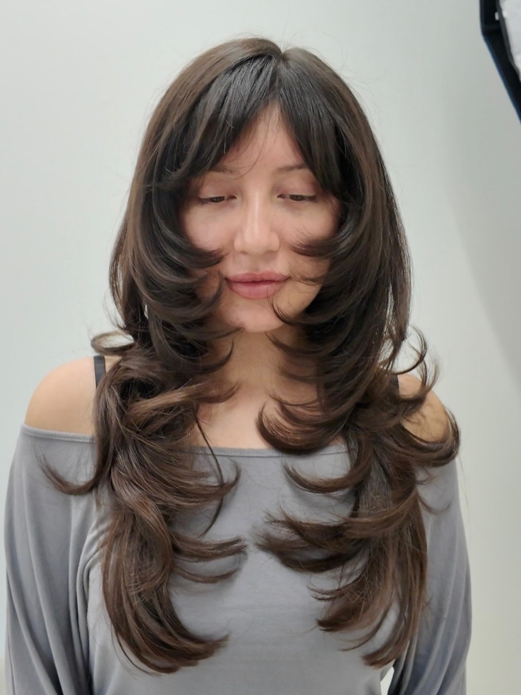 Soft Layered Butterfly Cut With Wispy Bangs