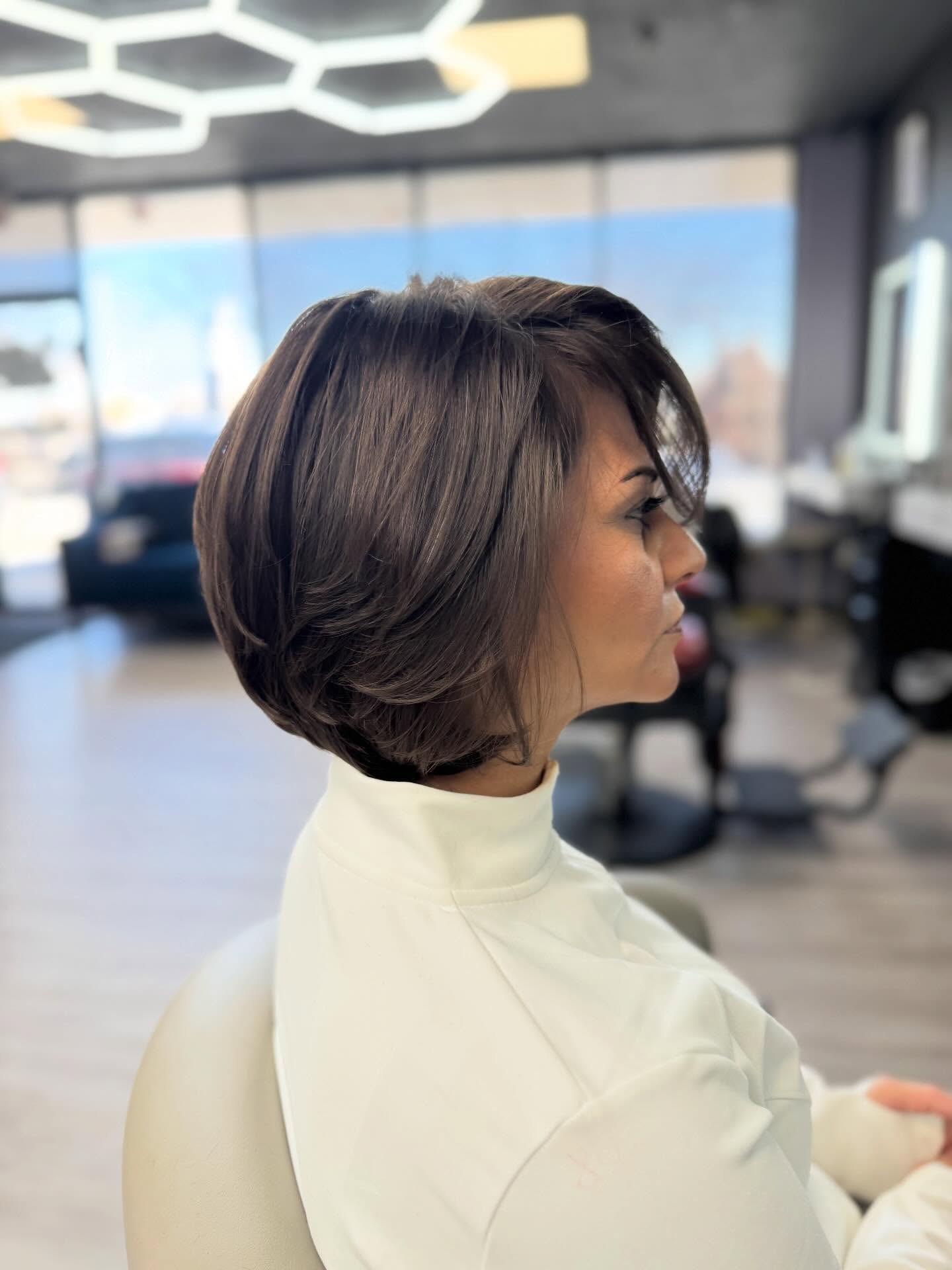 Sophisticated Layered Bob With Side Swept Bangs