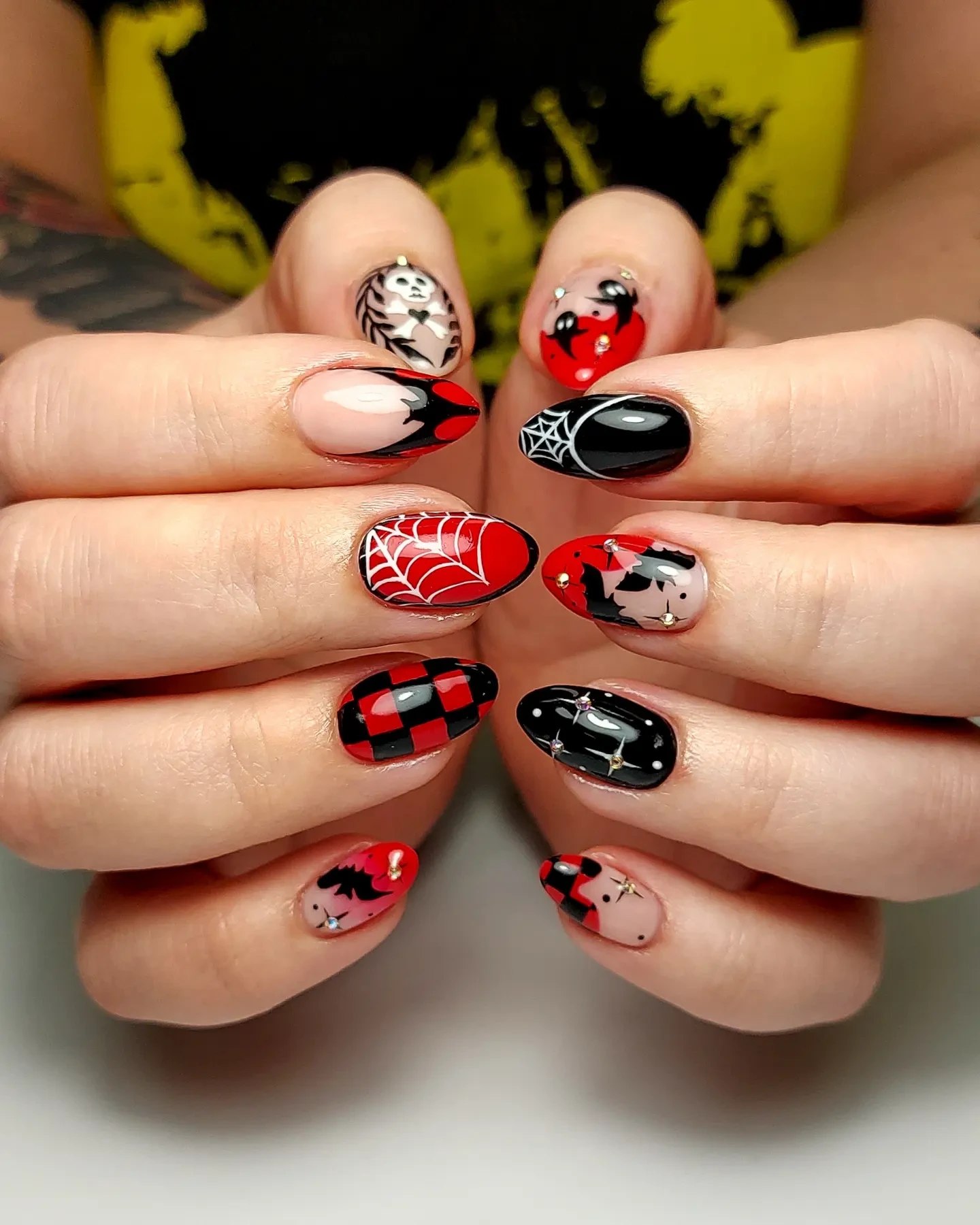 Spooky Halloween Bat and Spiderweb Almond Nails