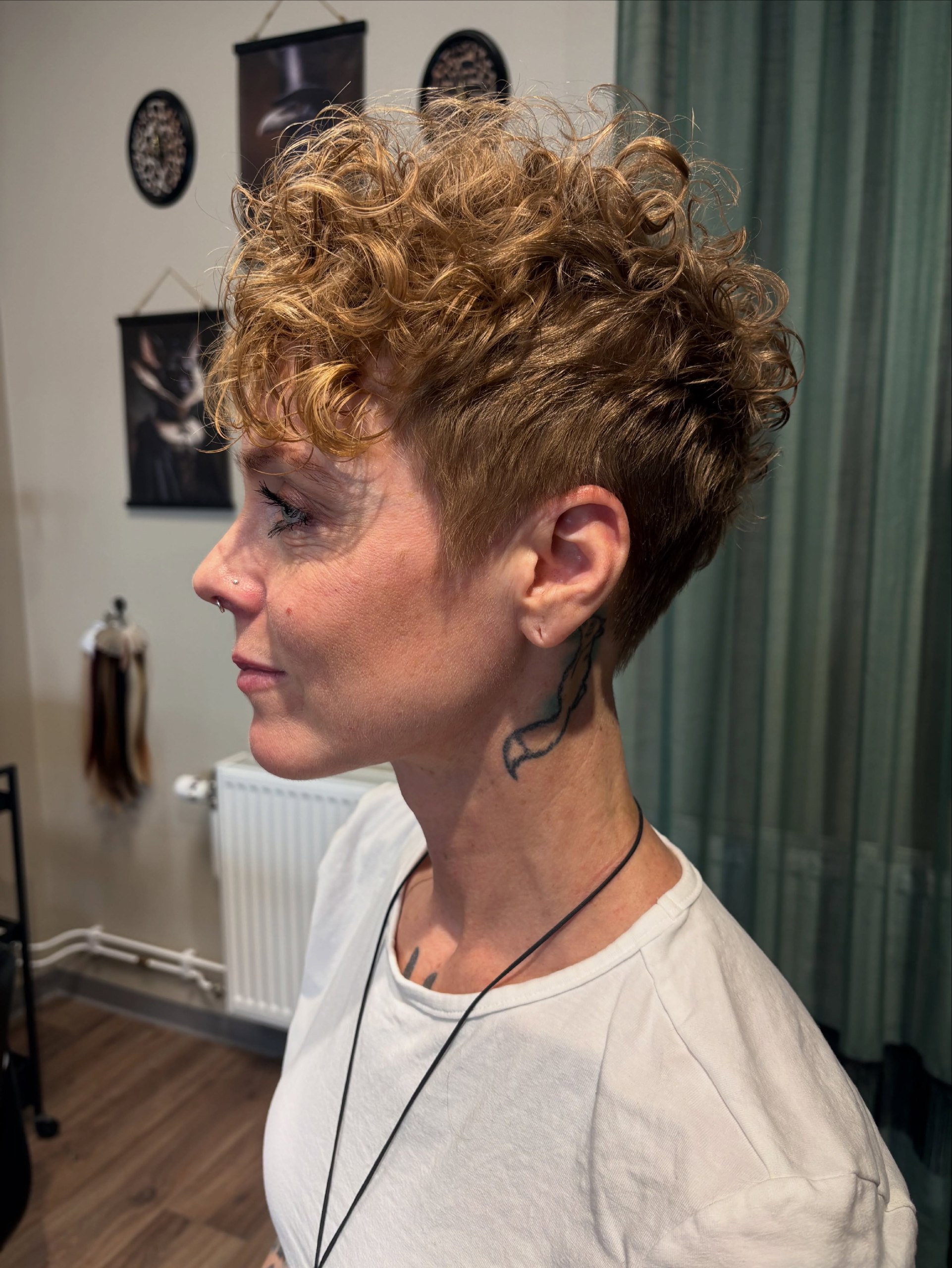 Tapered Pixie Cut With Defined Golden Curls