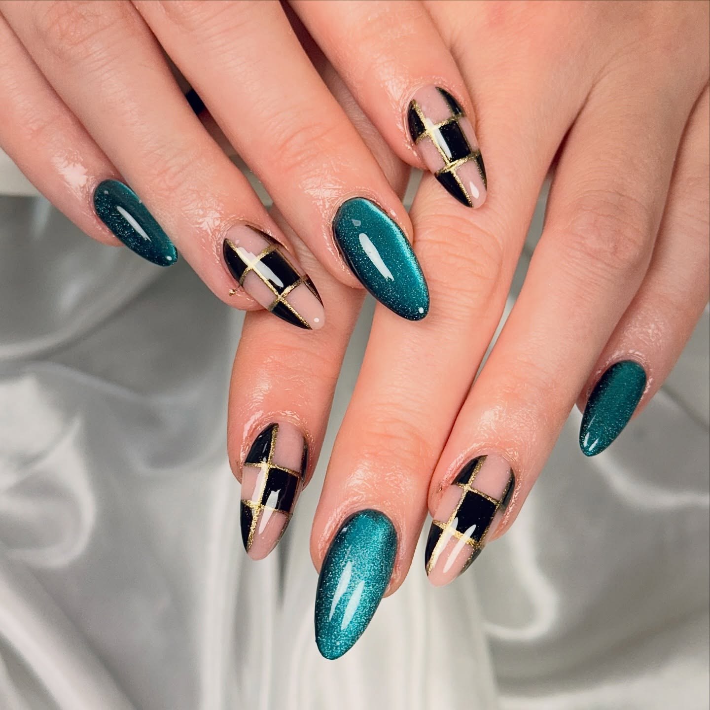 Teal Cat Eye and Black Gold Plaid Almond Nails