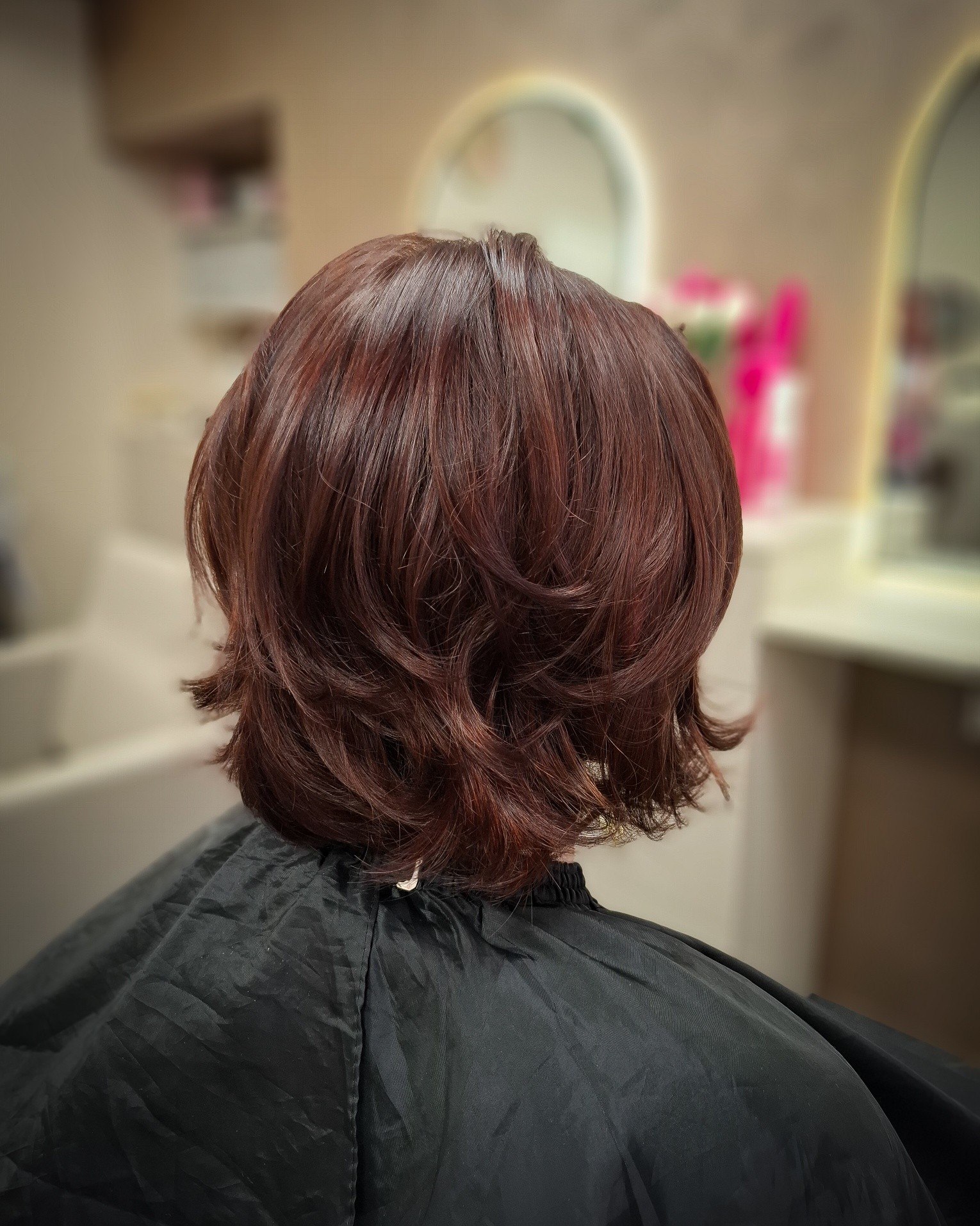 Textured Auburn Layered Bob With Soft Flicked Ends