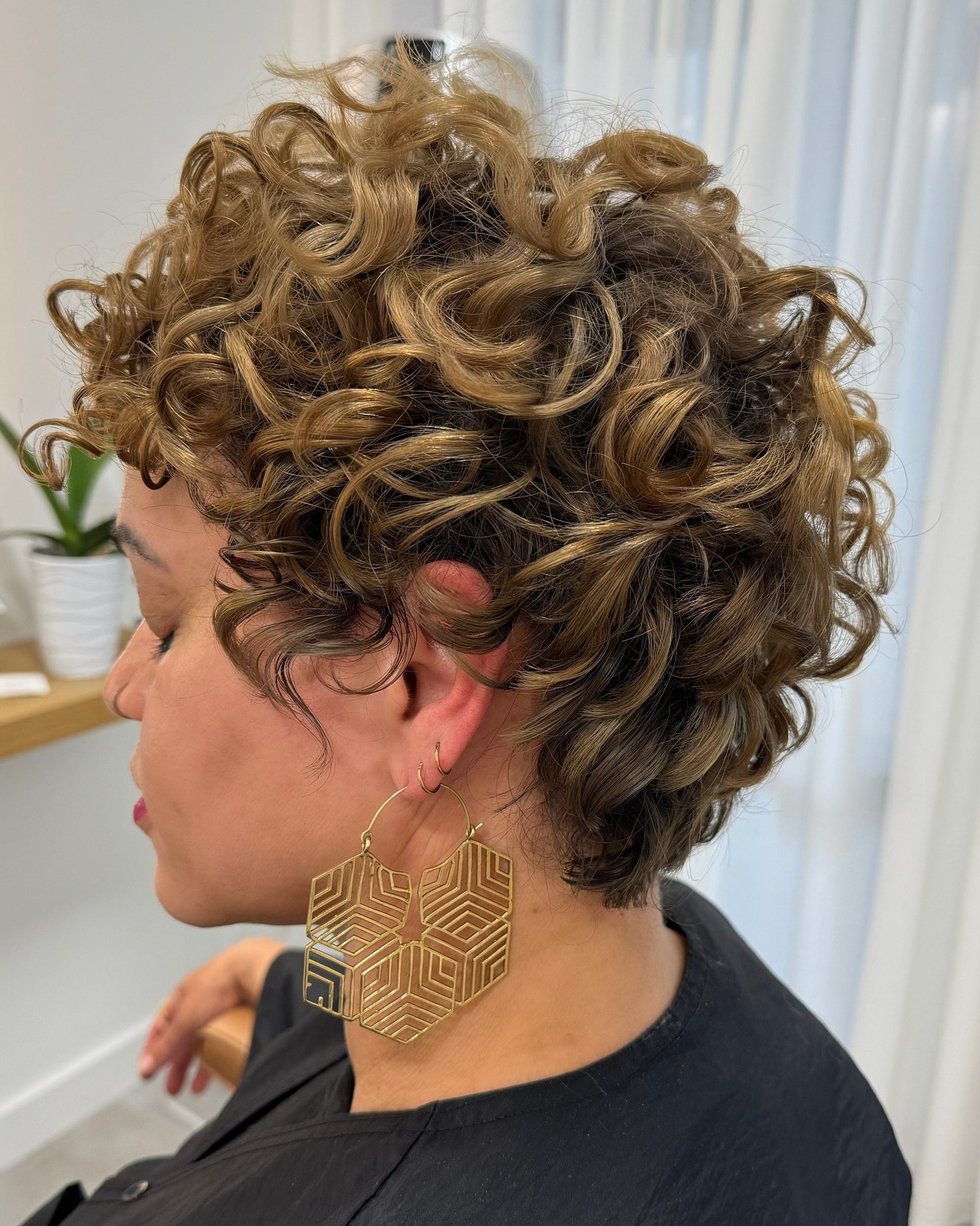 Textured Curly Pixie With Dimensional Honey Highlights