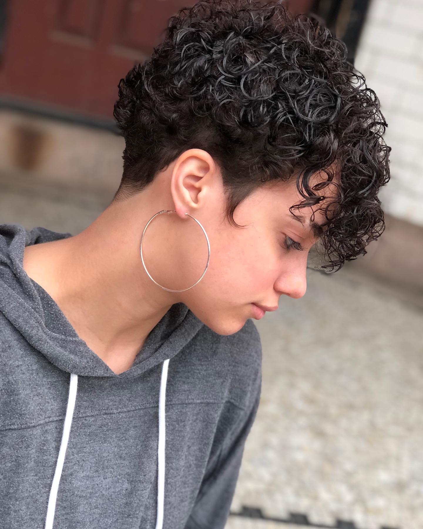 Textured Curly Pixie With Tapered Sides
