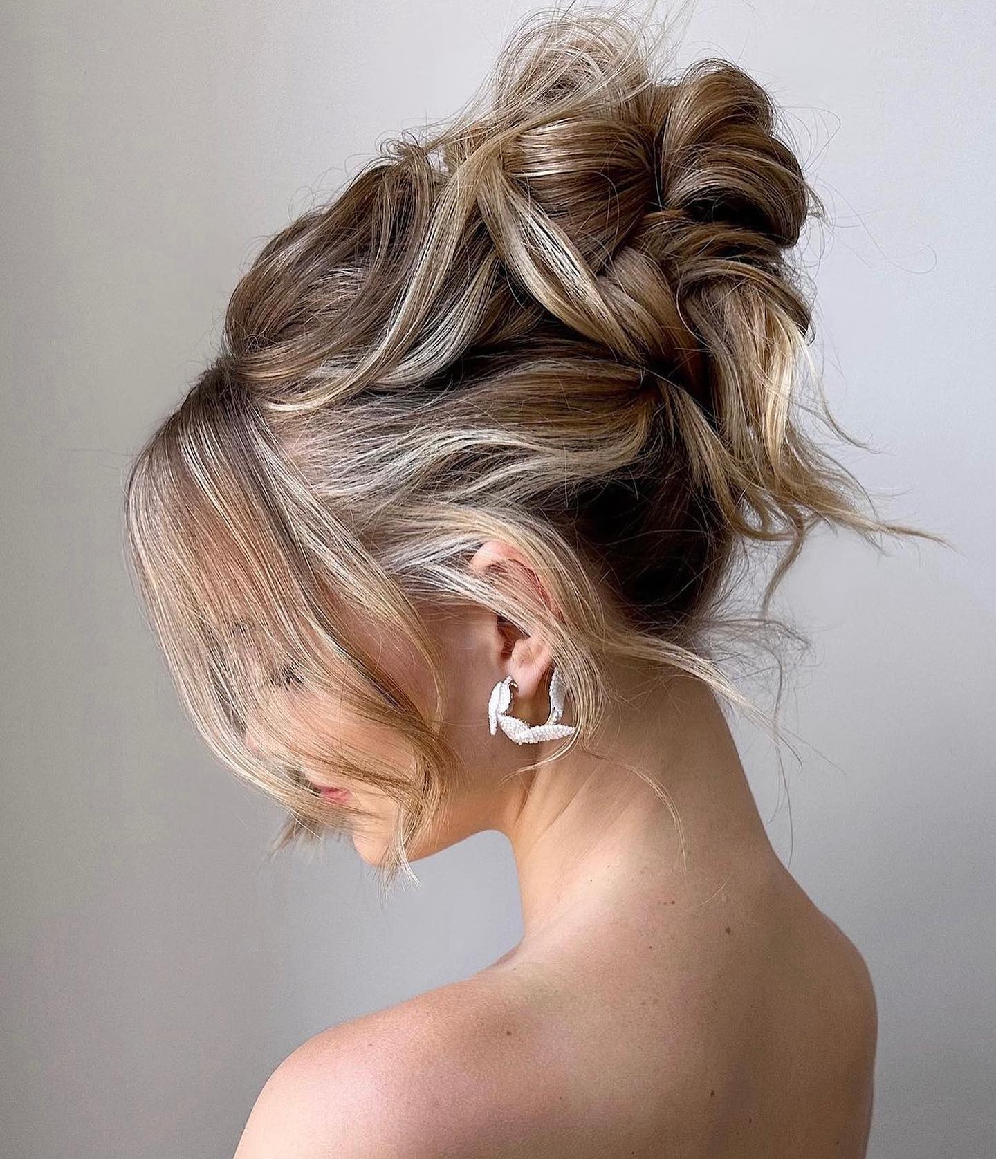 Textured Messy Updo With Face Framing Layers