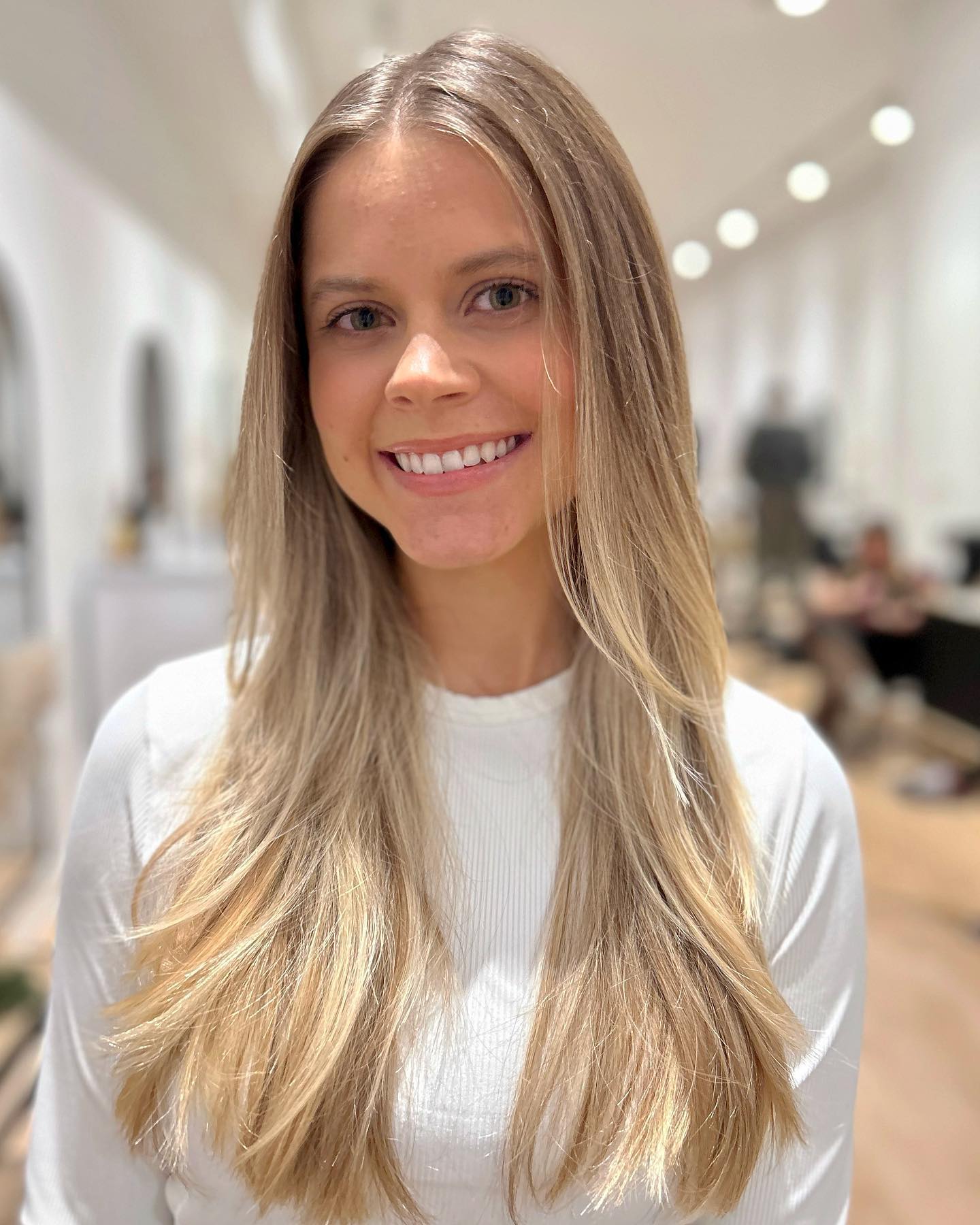 Textured Mid-Length Cut With Blonde Balayage