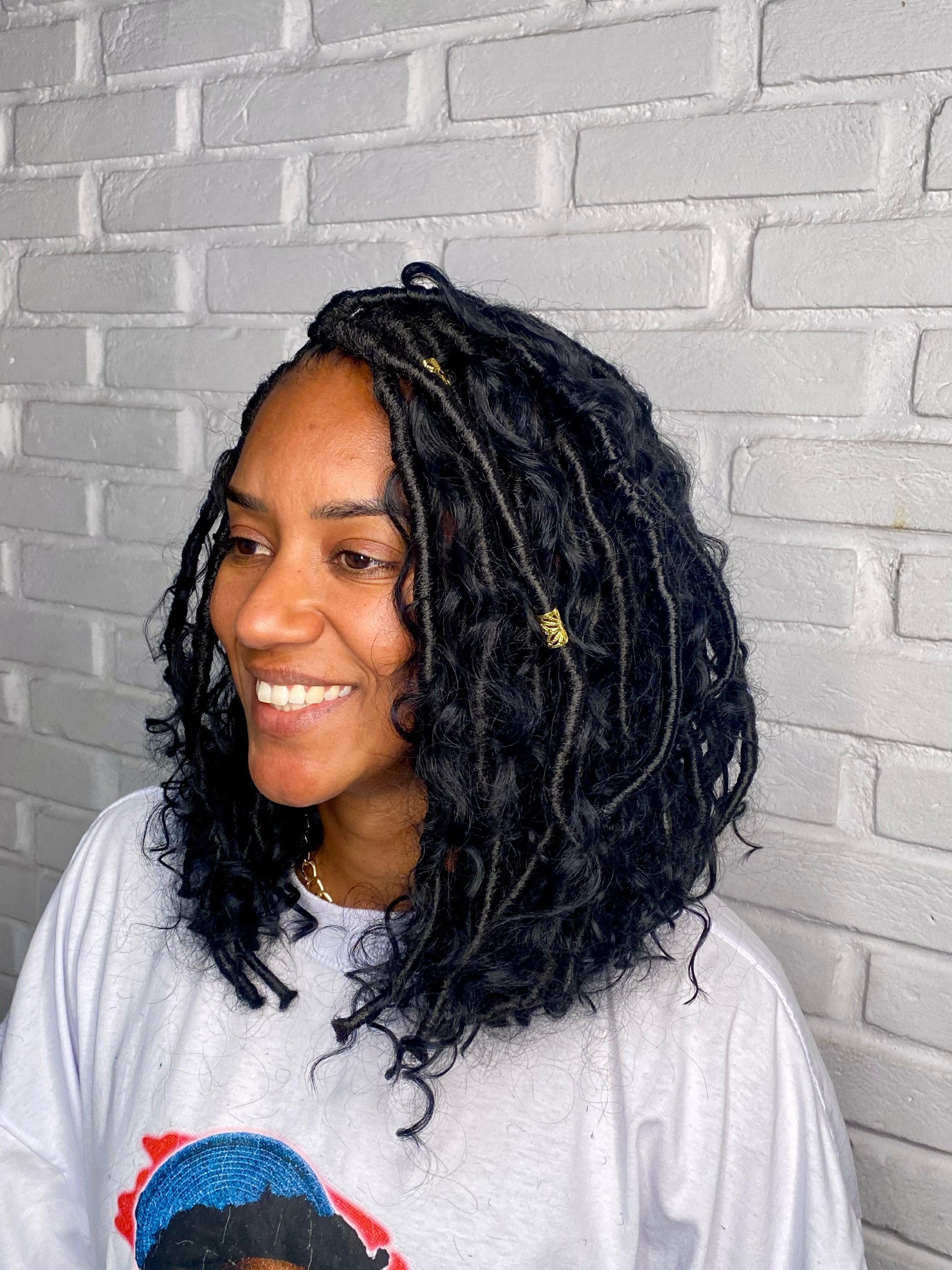Textured Shoulder Length Jet Black Faux Locs