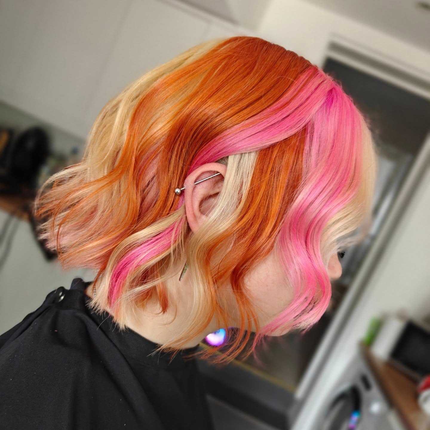 Vibrant Orange and Pink Swirl Bob