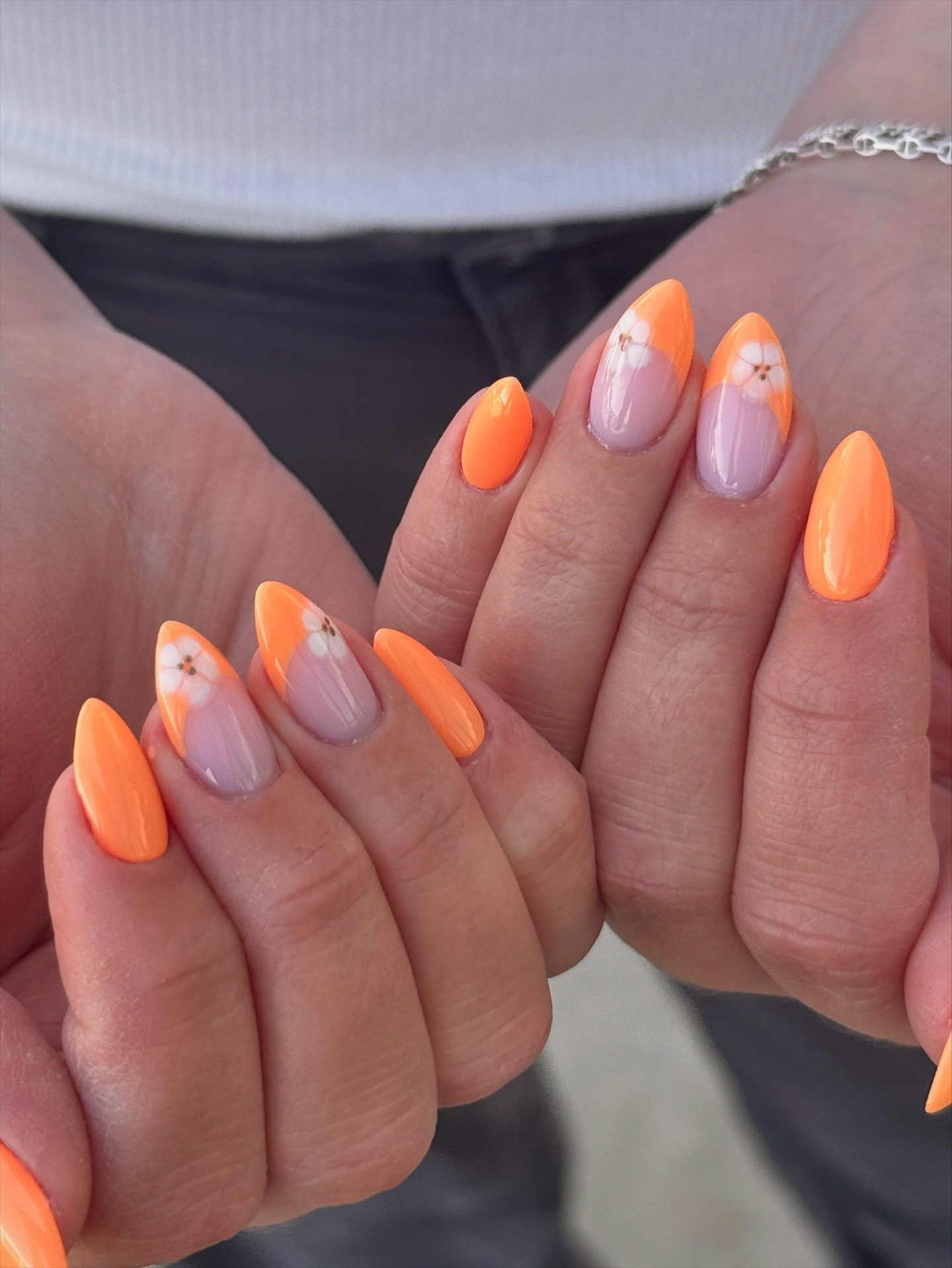 Vibrant Orange Floral French Almond Nails