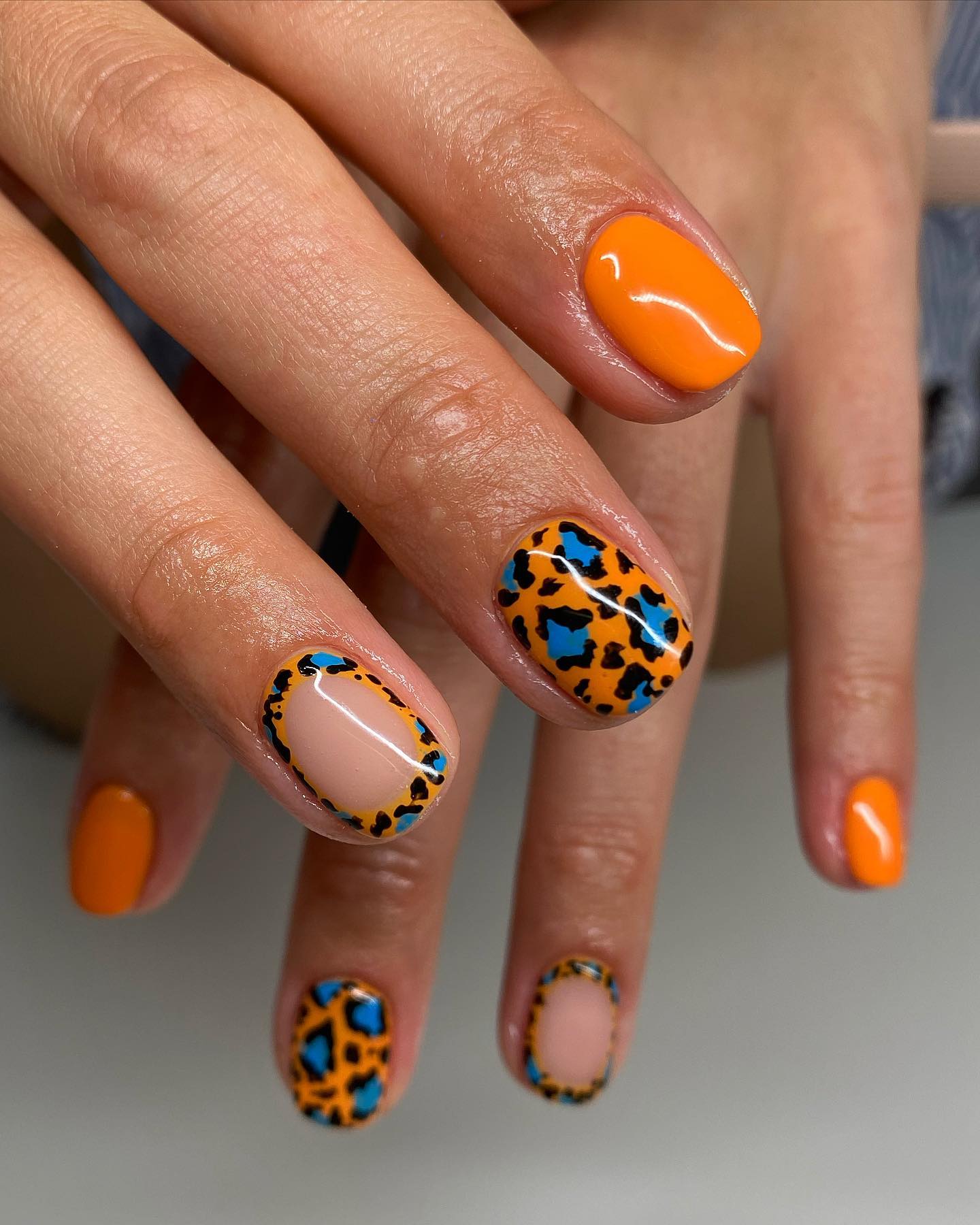 Vibrant Orange Leopard Print French Tips
