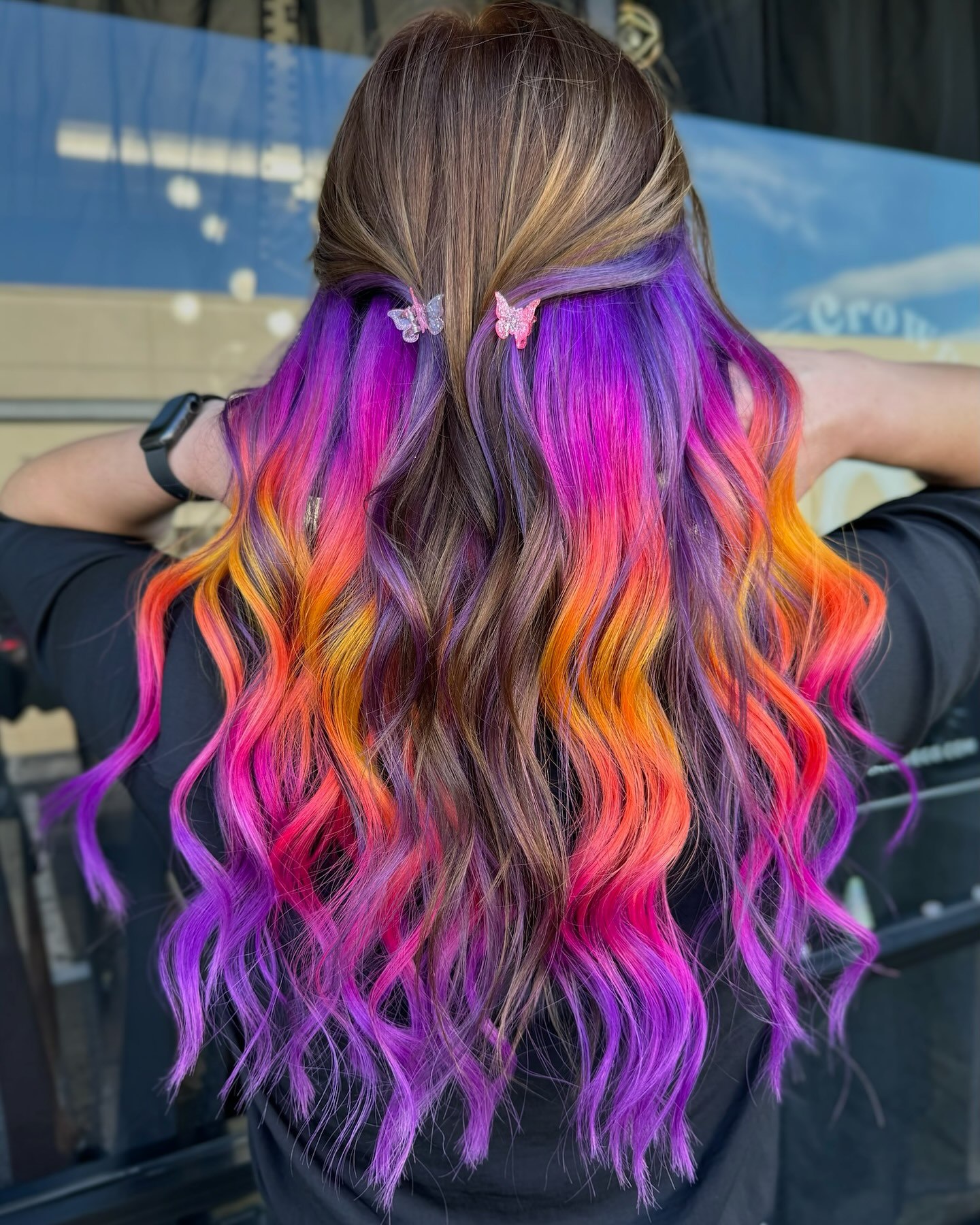 Vibrant Sunset Tones With Peekaboo Purple Highlights