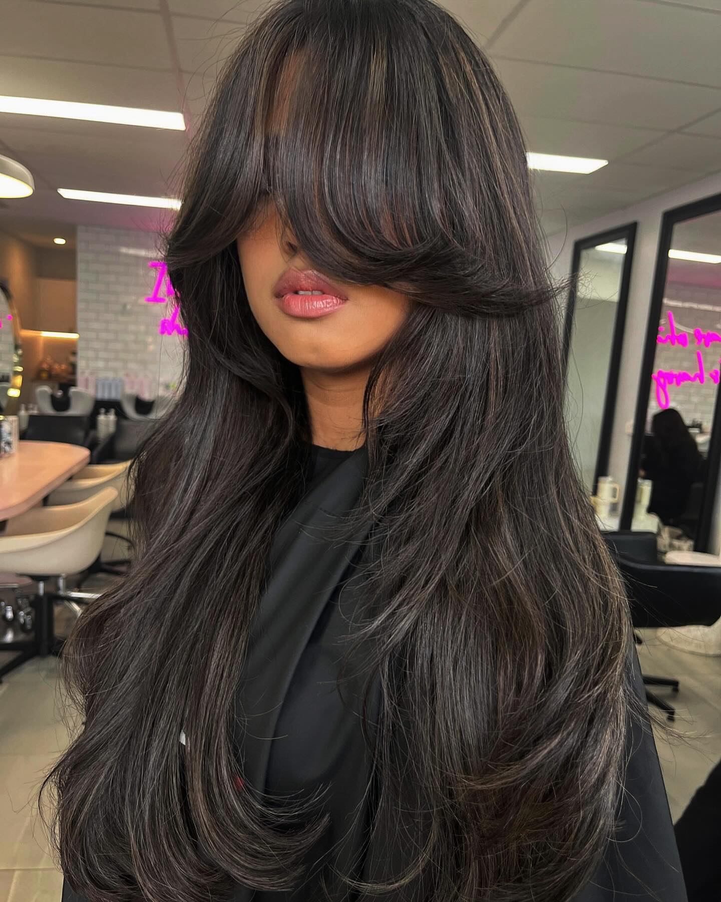Voluminous Butterfly Layers With Dramatic Curtain Bangs
