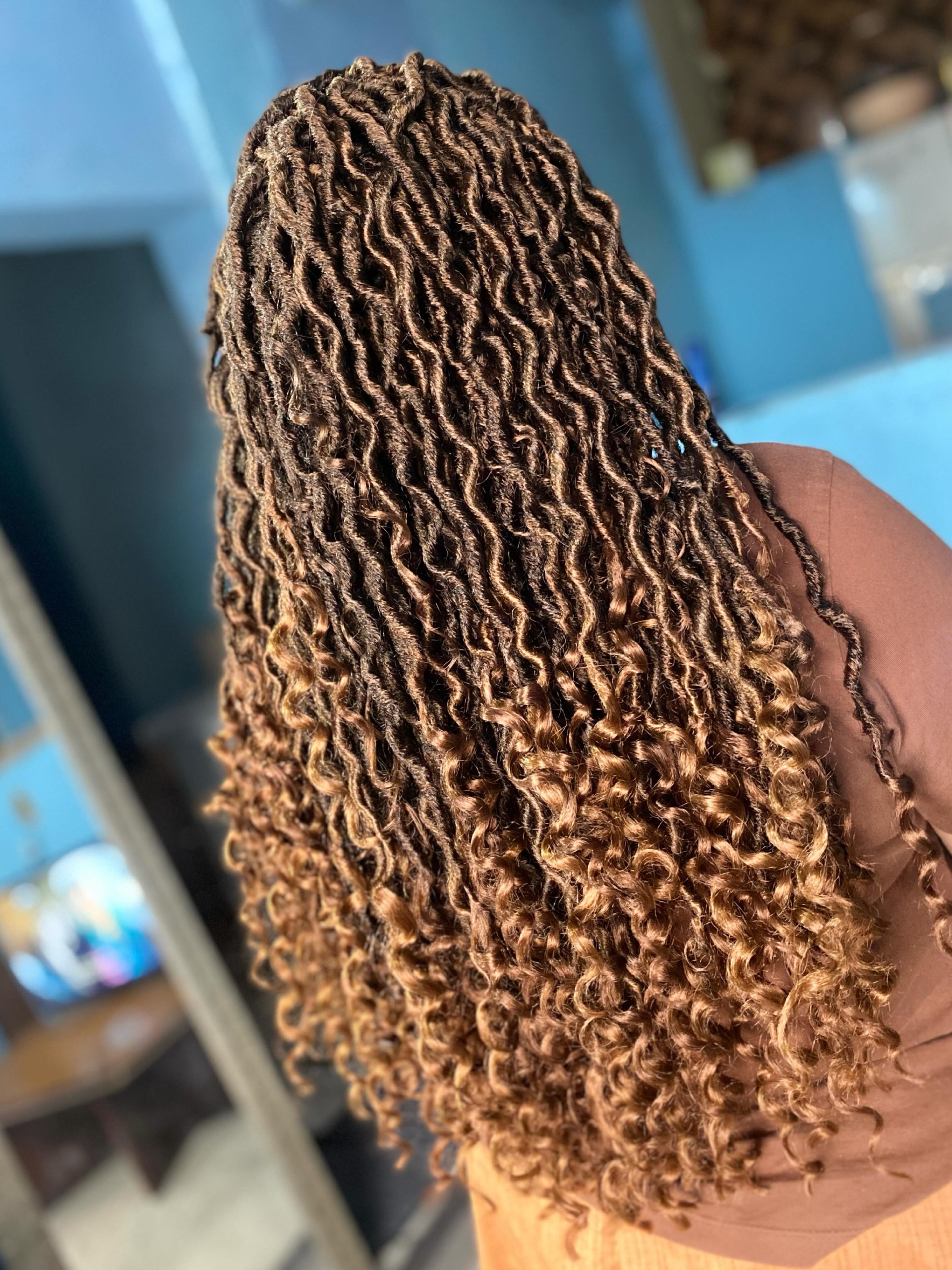 Wavy Goddess Faux Locs In Warm Caramel Brown