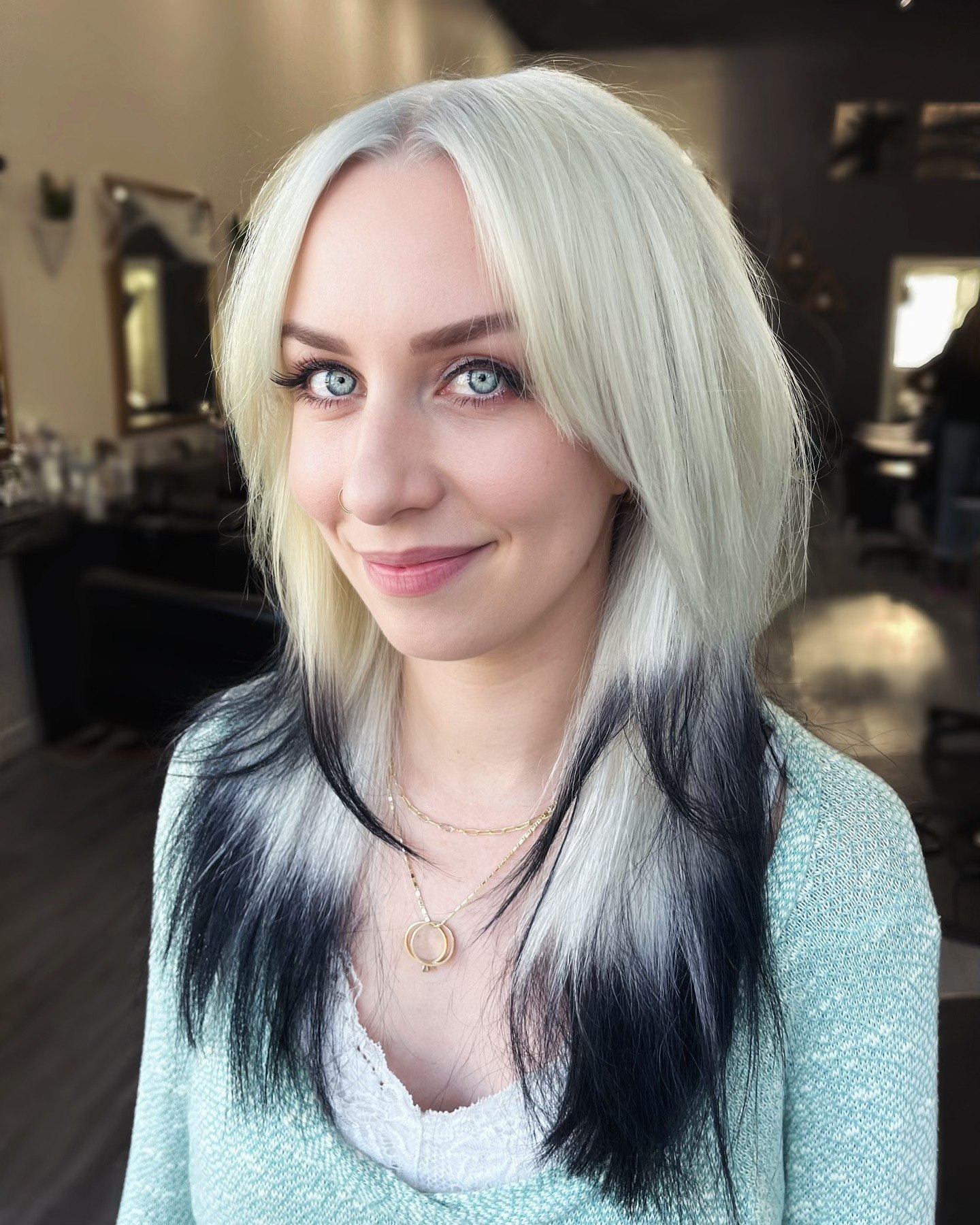 Bold Black Highlights On Platinum Blonde Lob