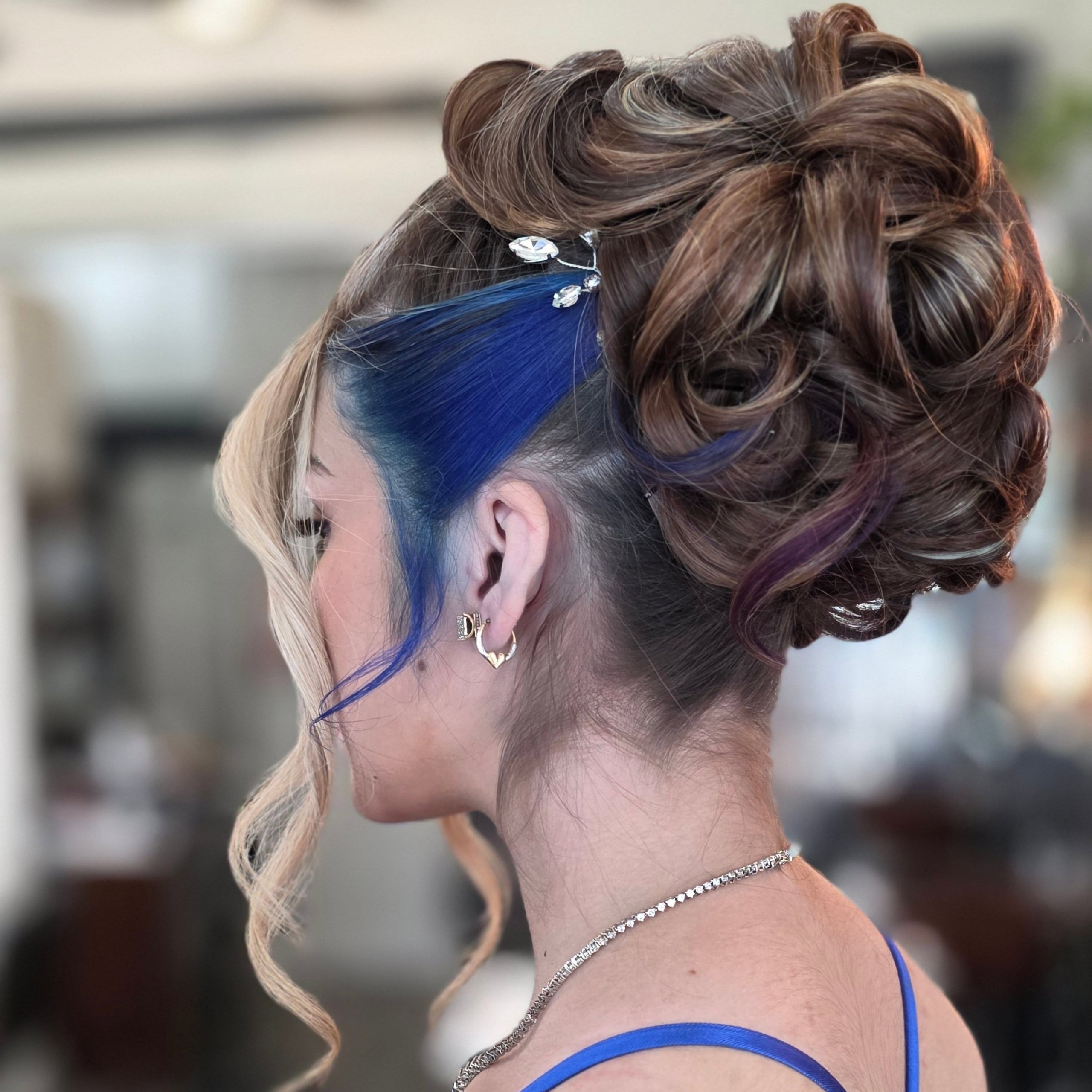 Bold Blue Streaks Voluminous Updo For Prom