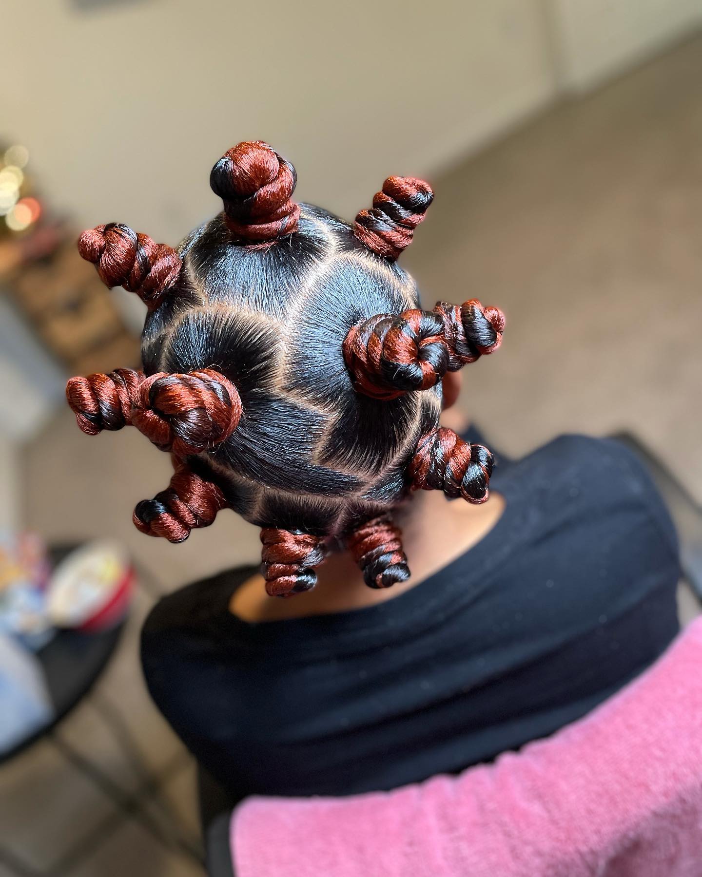 Bold Red & Black Bantu Knots Updo