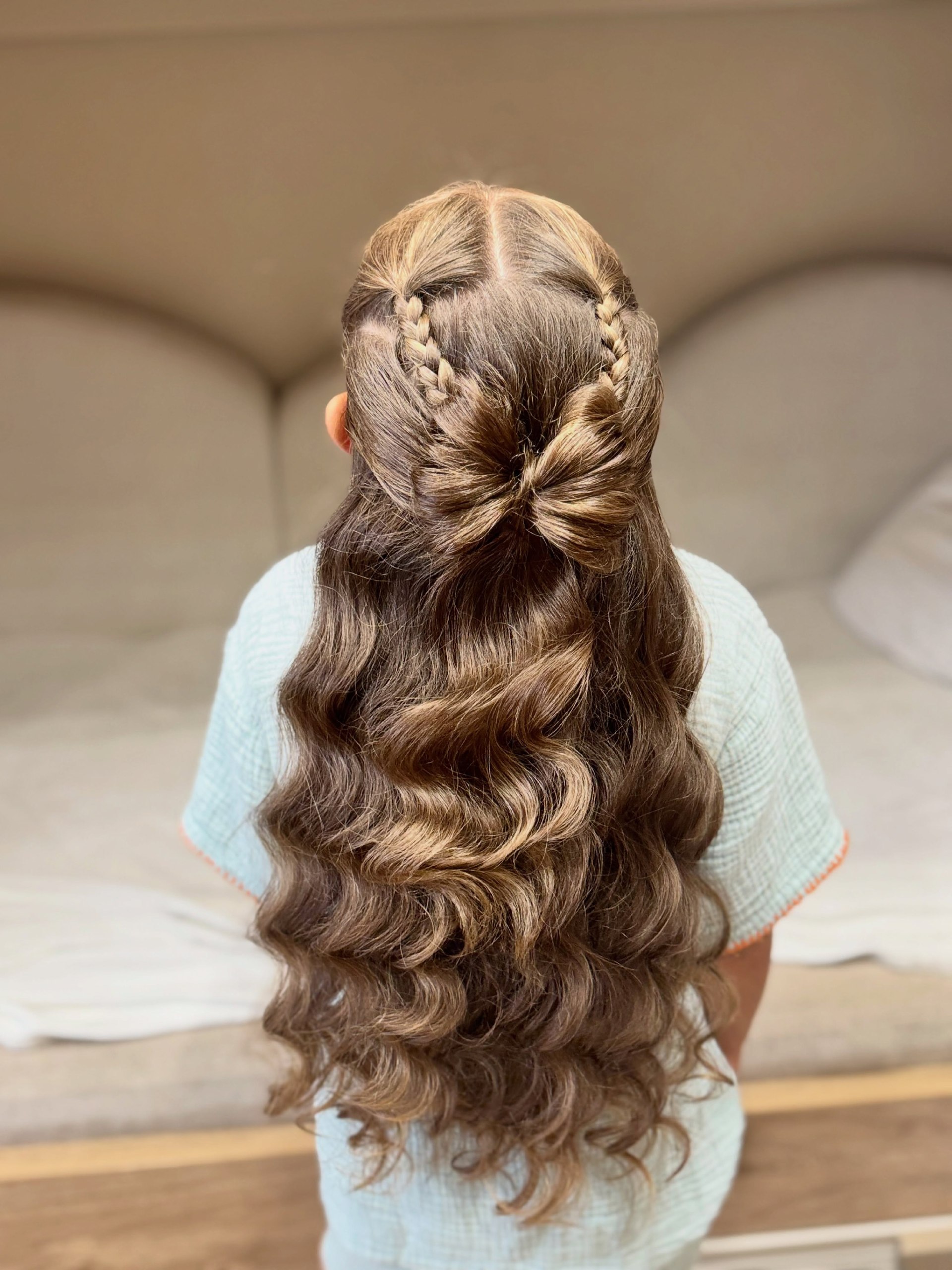 Braided Bow Half-Up With Loose Curls