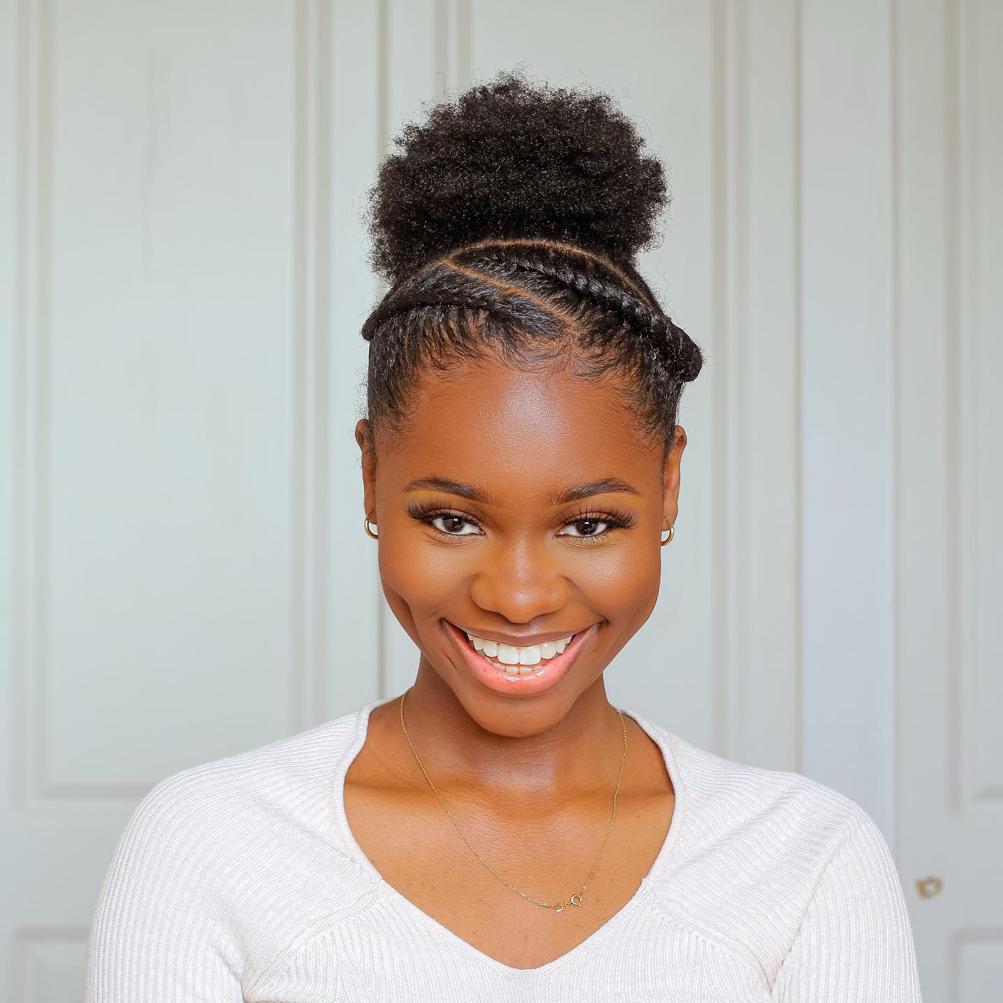 Braided Crown With A High Afro Puff