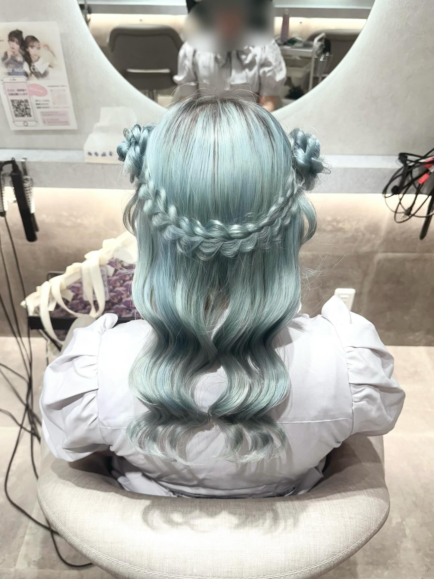 Braided Crown With Double Buns In Pastel Blue