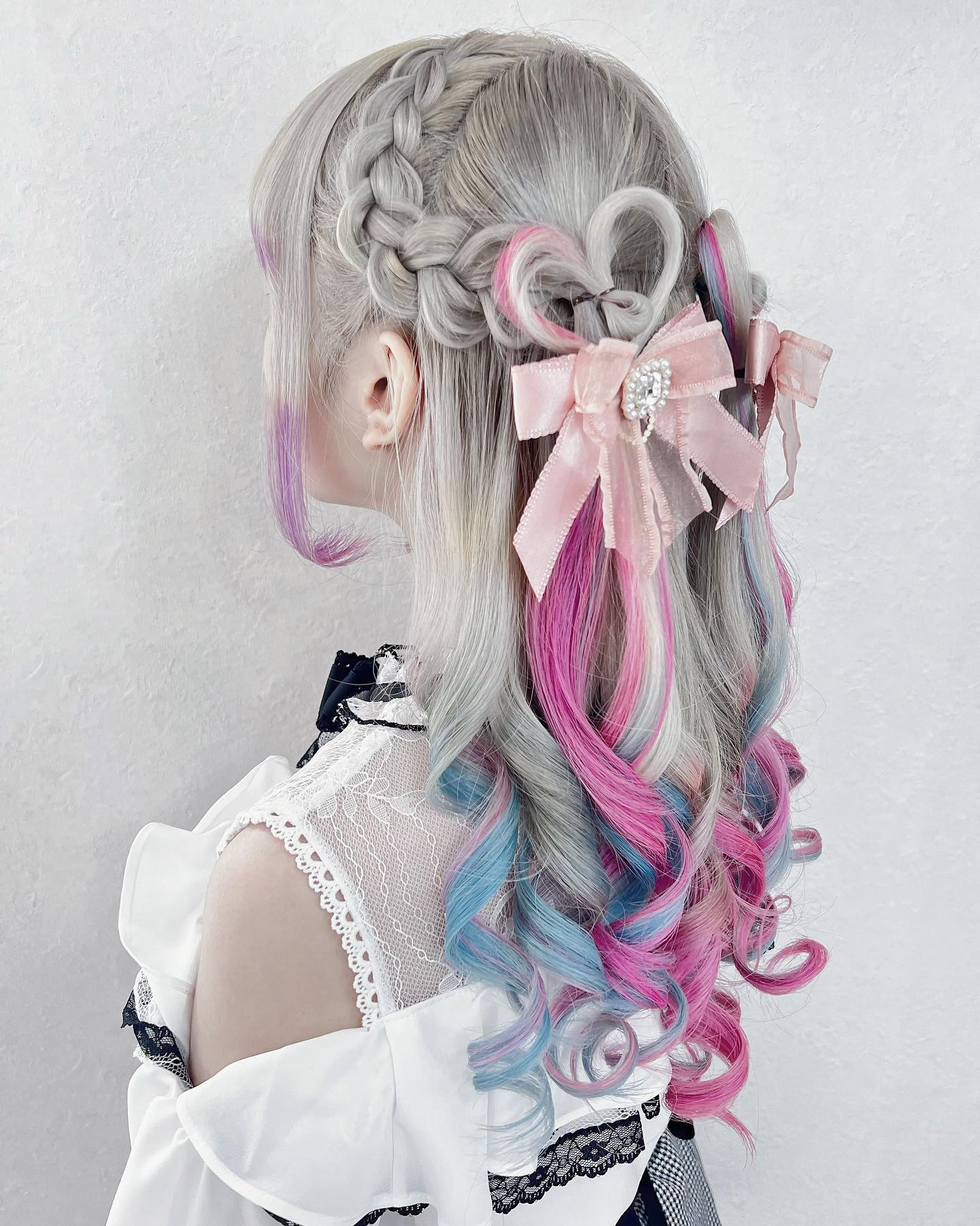 Braided Pastel Heart Updo With Pink Bows