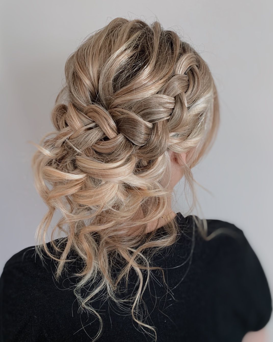 Braided Updo With Soft, Loose Curls