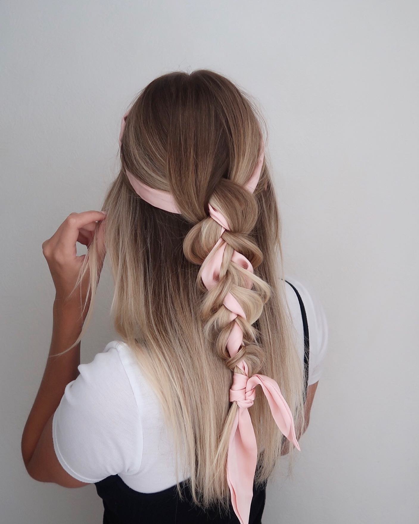 Chic Braided Hairstyle With Pink Scarf Accent