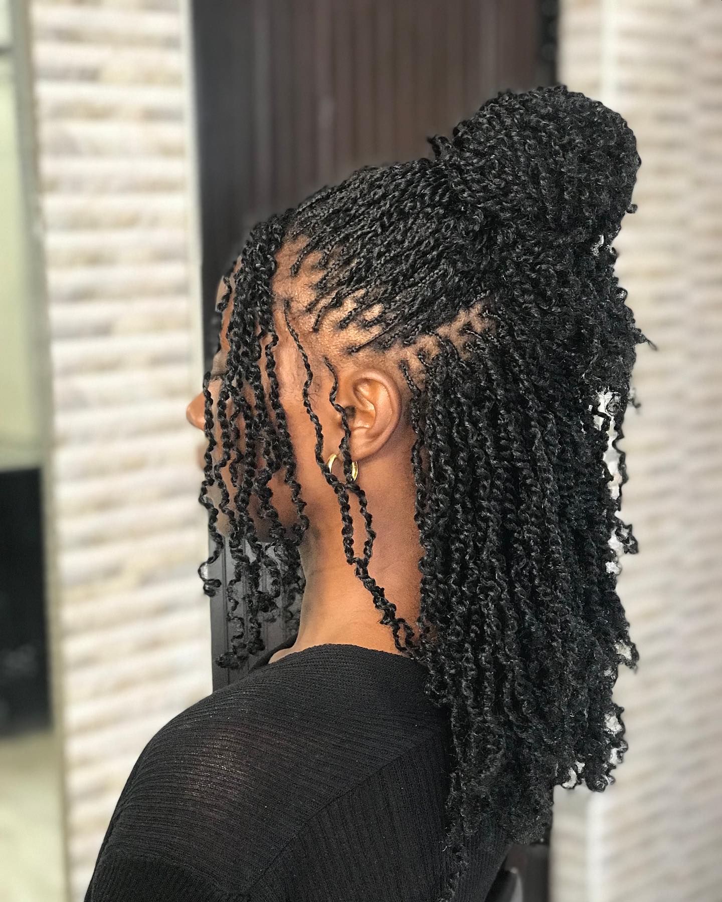 Chic High Bun With Cascading Mini Twists