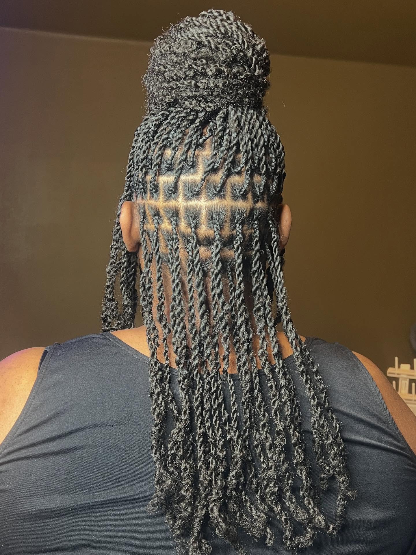 Chic High Bun With Defined Mini Twists