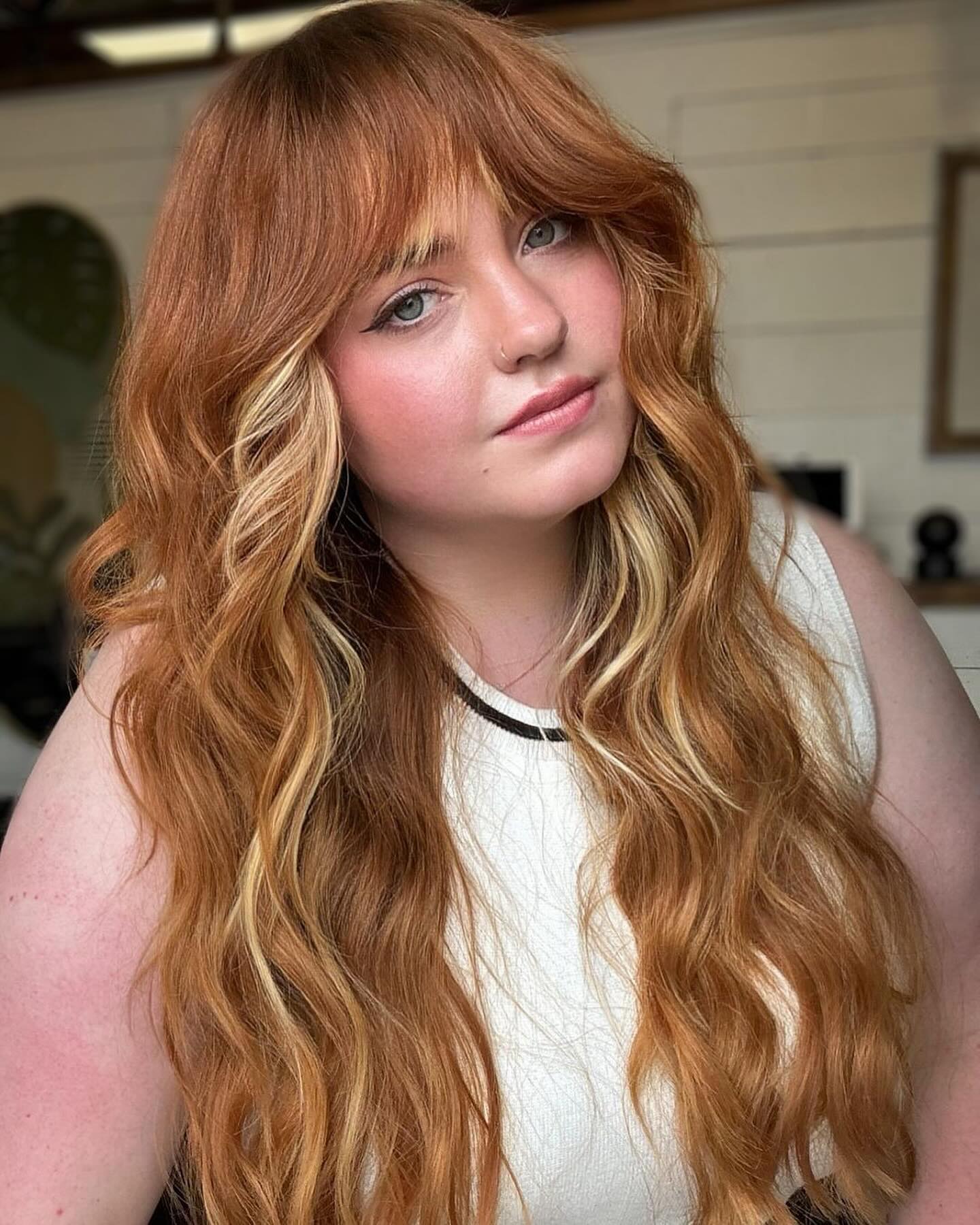 Copper Waves With Face-Framing Blonde Highlights