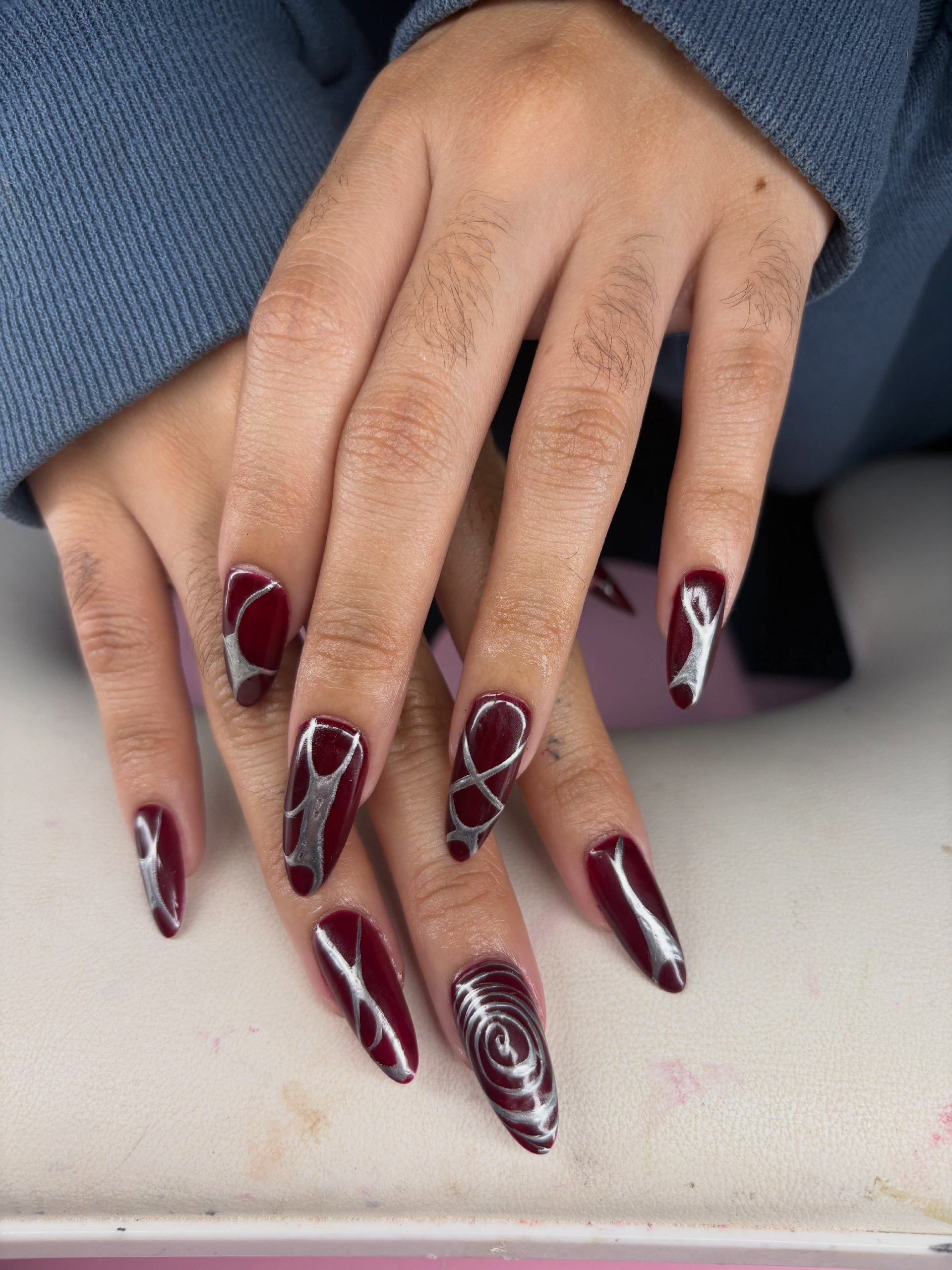 Deep Burgundy Swirls with Silver Chrome Accents