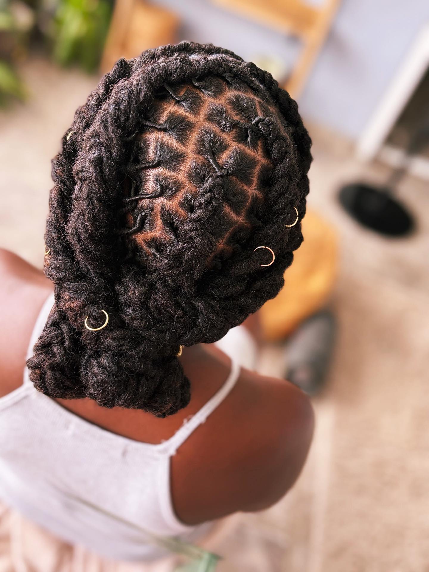 Diamond Part Barrel Twist Updo With Gold Hoops