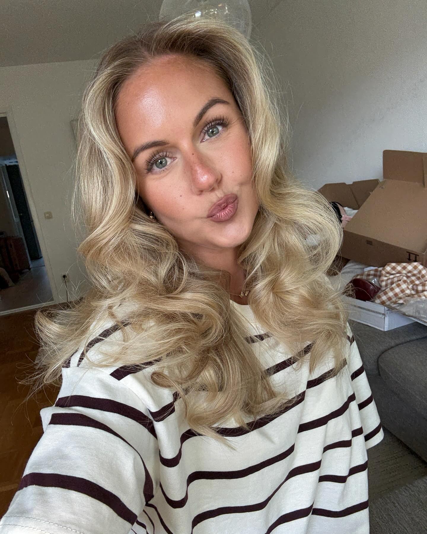 Effortless Blonde Waves with Voluminous Layers