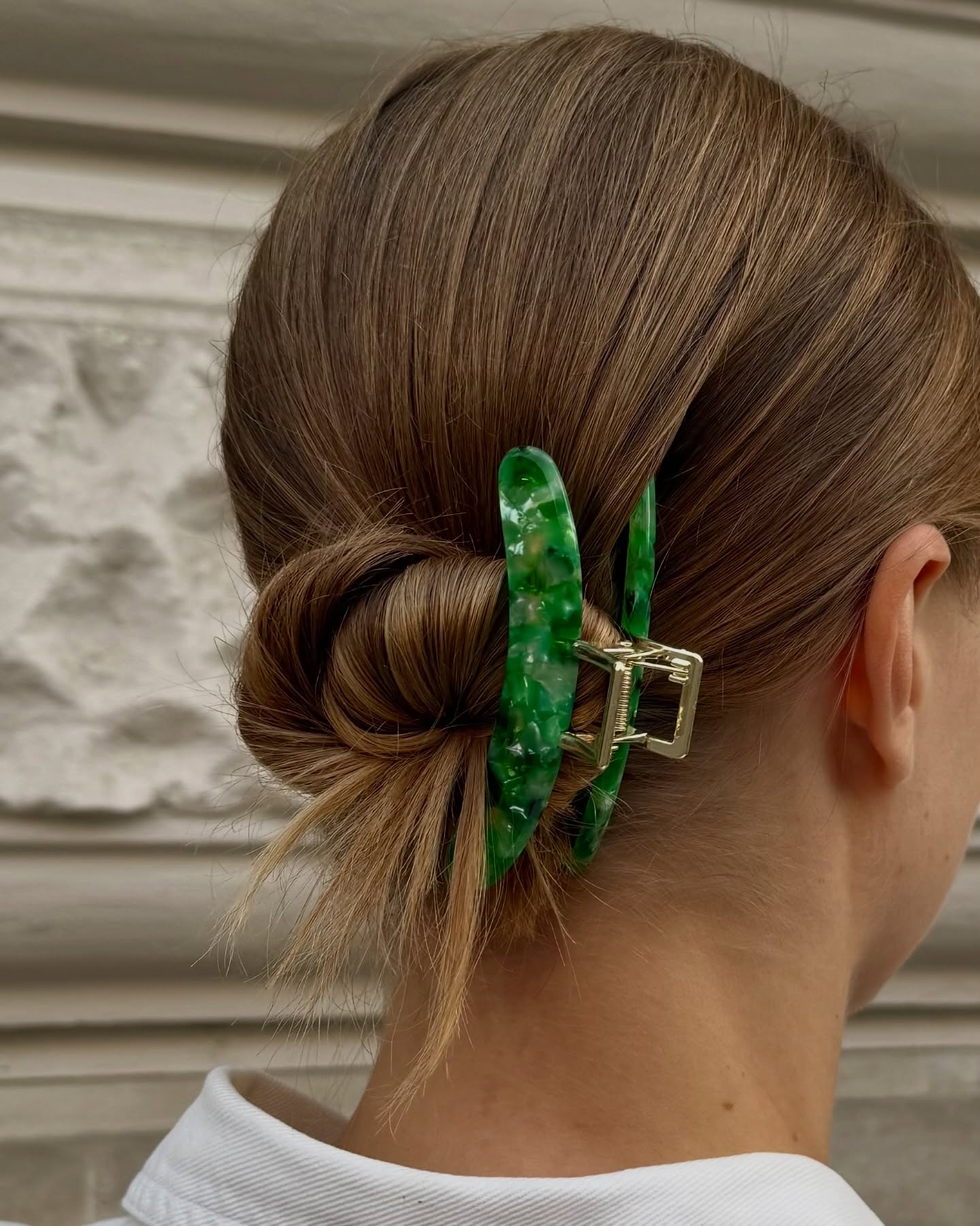 Effortless Chic Low Bun With Green Claw Clip